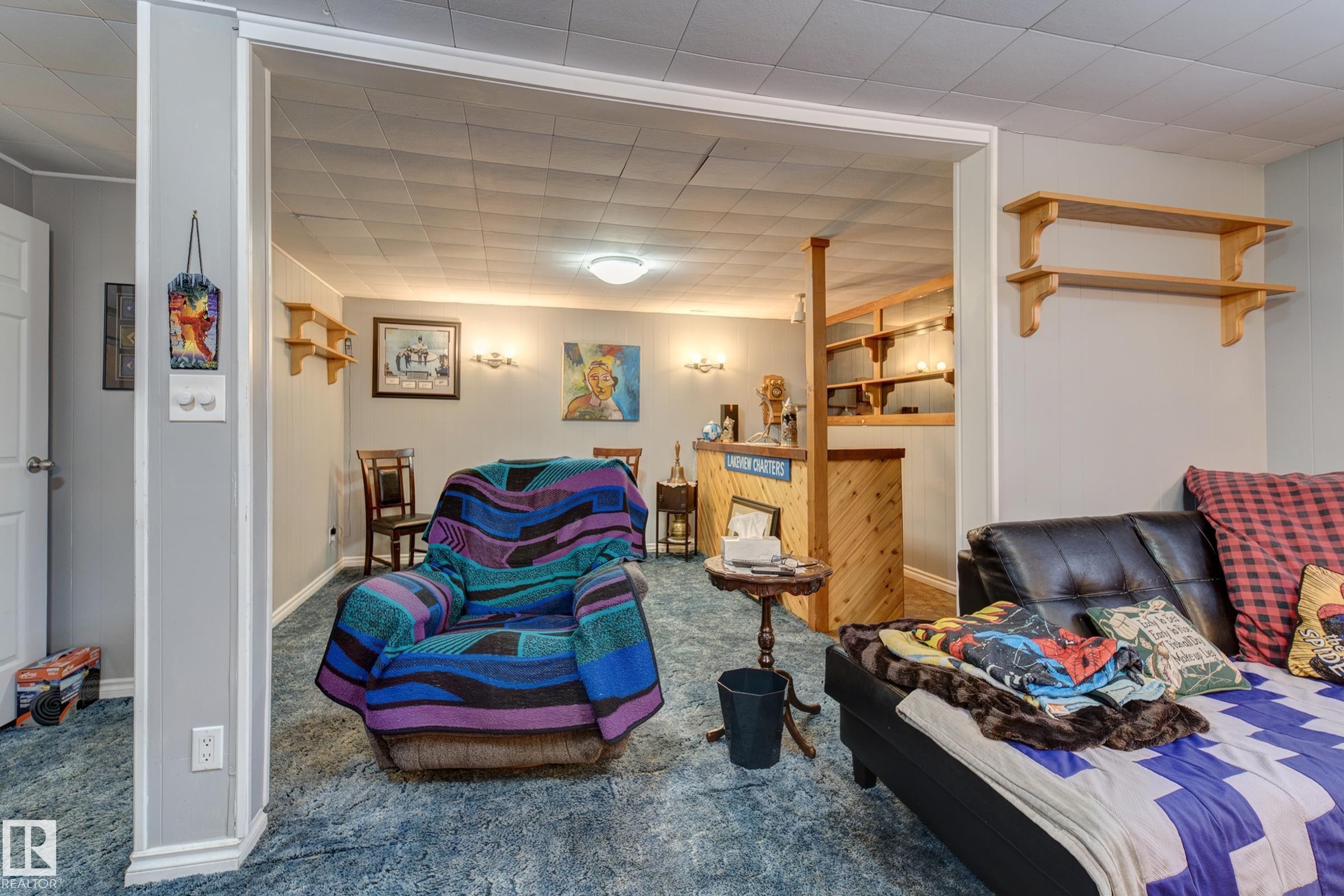 Carpeted bedroom with baseboards - 4823 10 Avenue, Edmonton, AB - Indoor