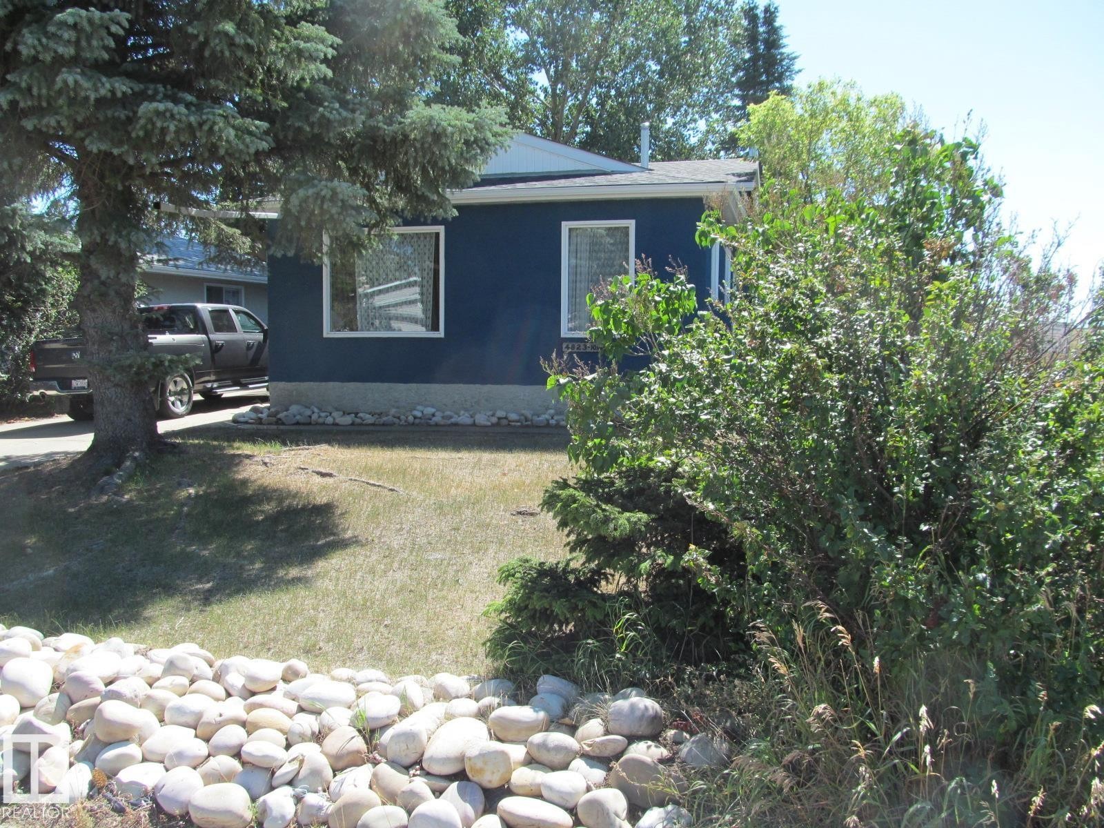 View of property exterior featuring a lawn - 4823 10 Avenue, Edmonton, AB - Outdoor