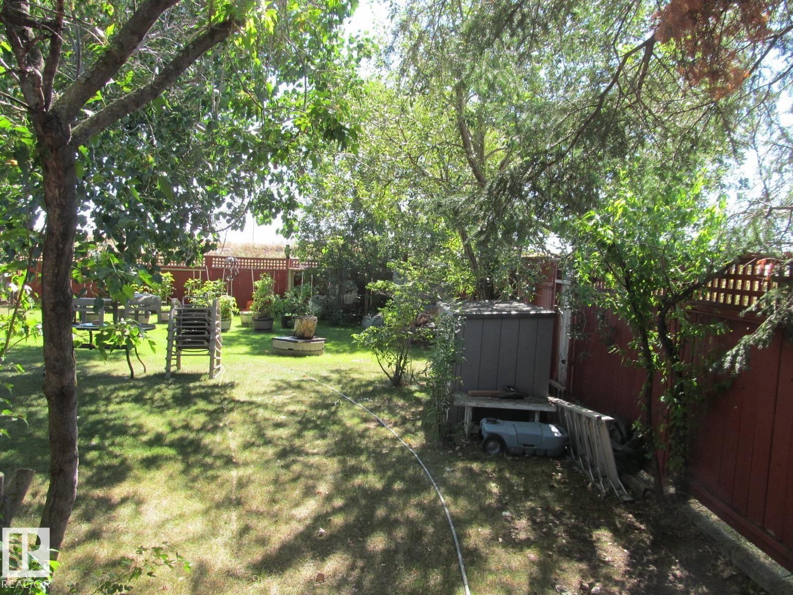 Fenced backyard with a shed - 4823 10 Avenue, Edmonton, AB - Outdoor