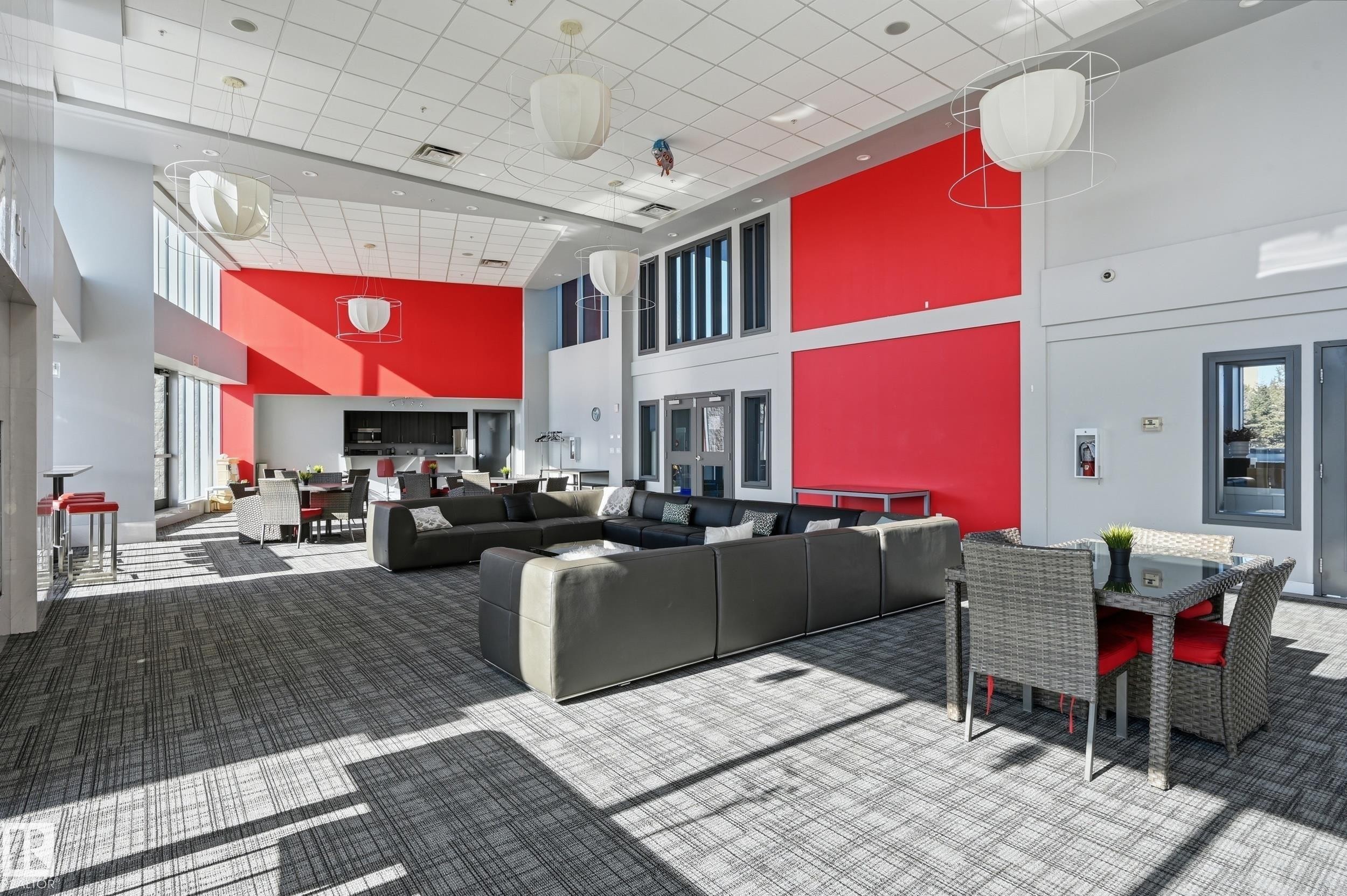 Lobby featuring a high ceiling - 511 5151 Windermere Boulevard, Edmonton, AB - Indoor Photo Showing Other Room