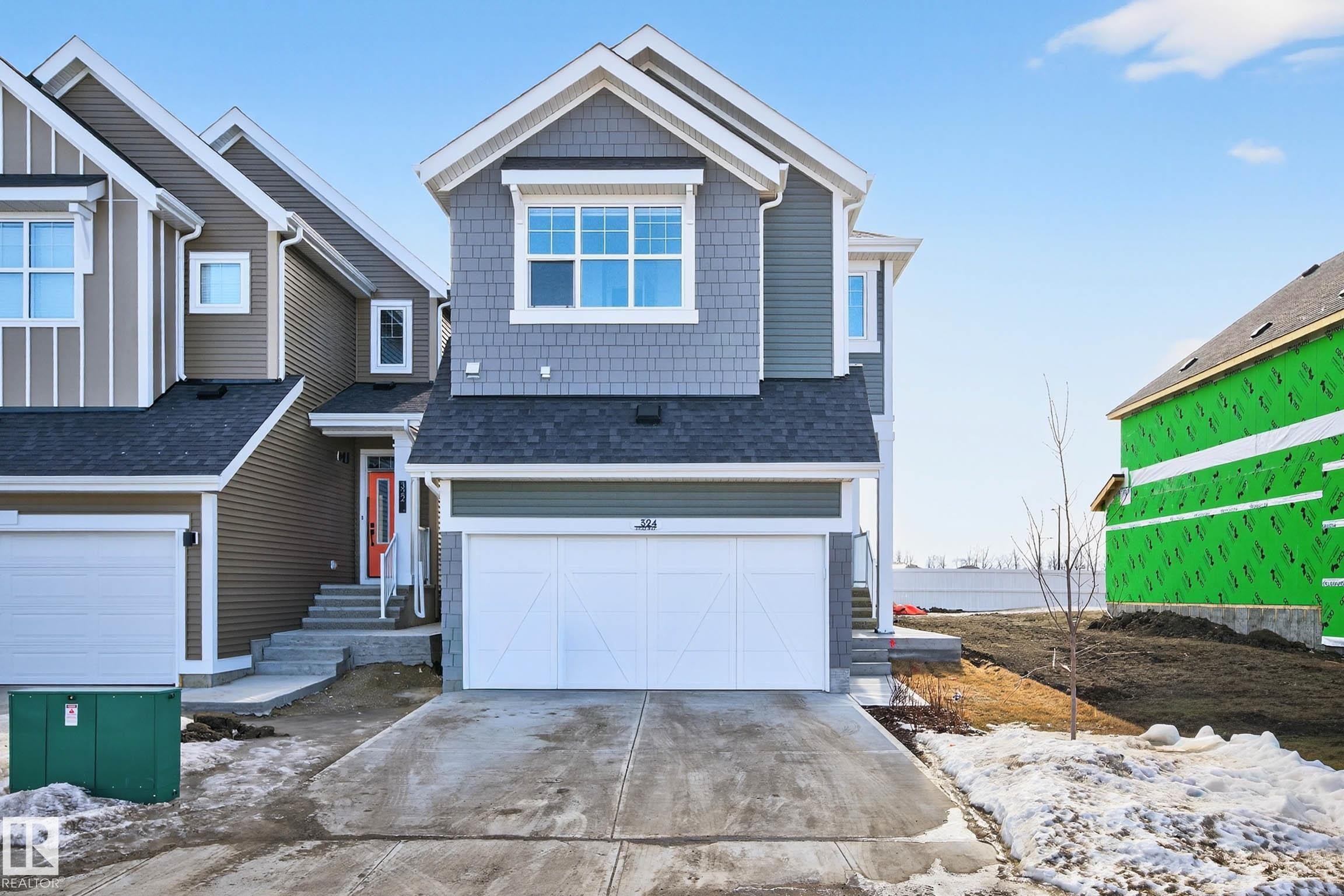 324 Stiles Way, Leduc, AB - Outdoor With Facade