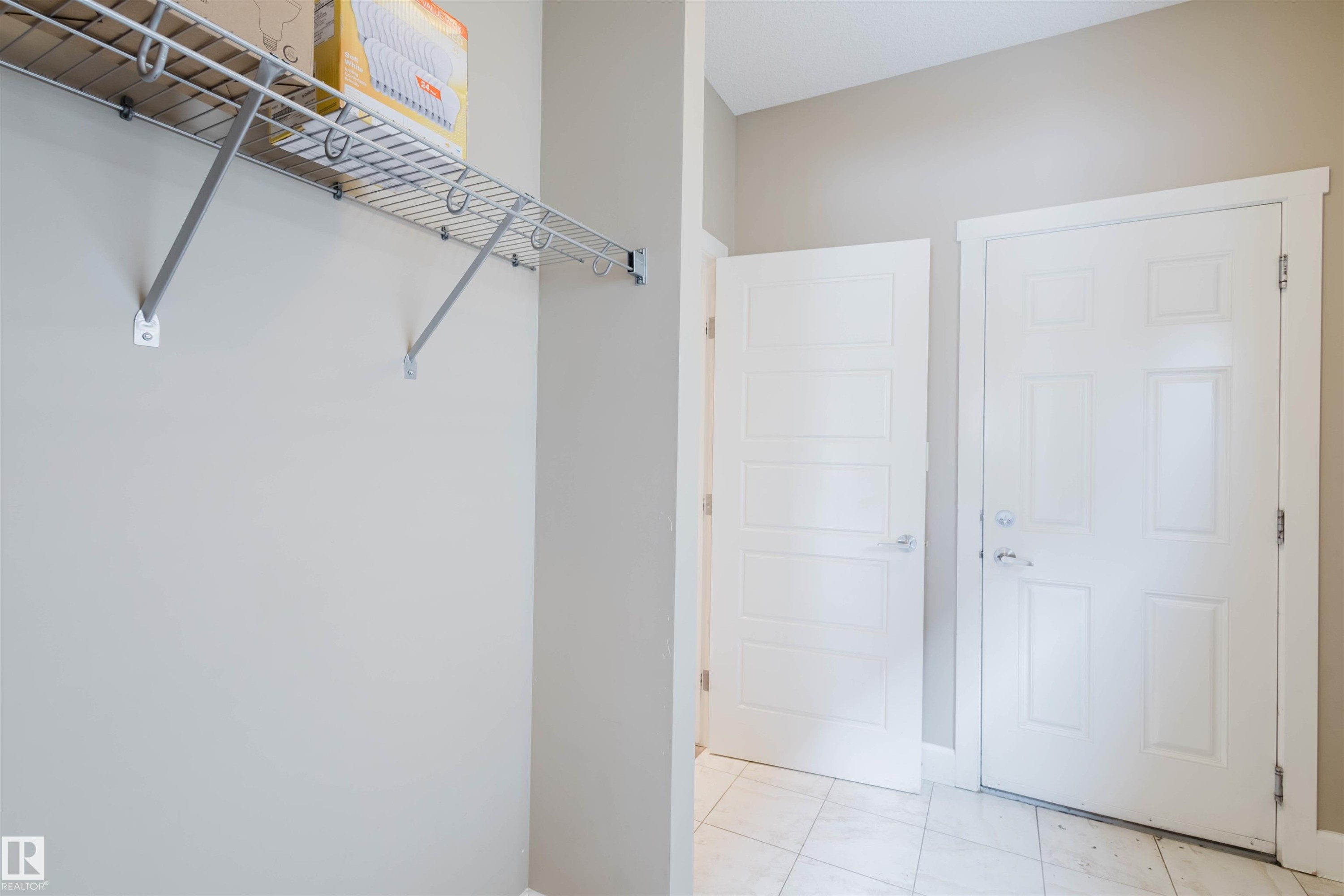 View of walk in closet - 1957 Ainslie Link, Edmonton, AB - Indoor