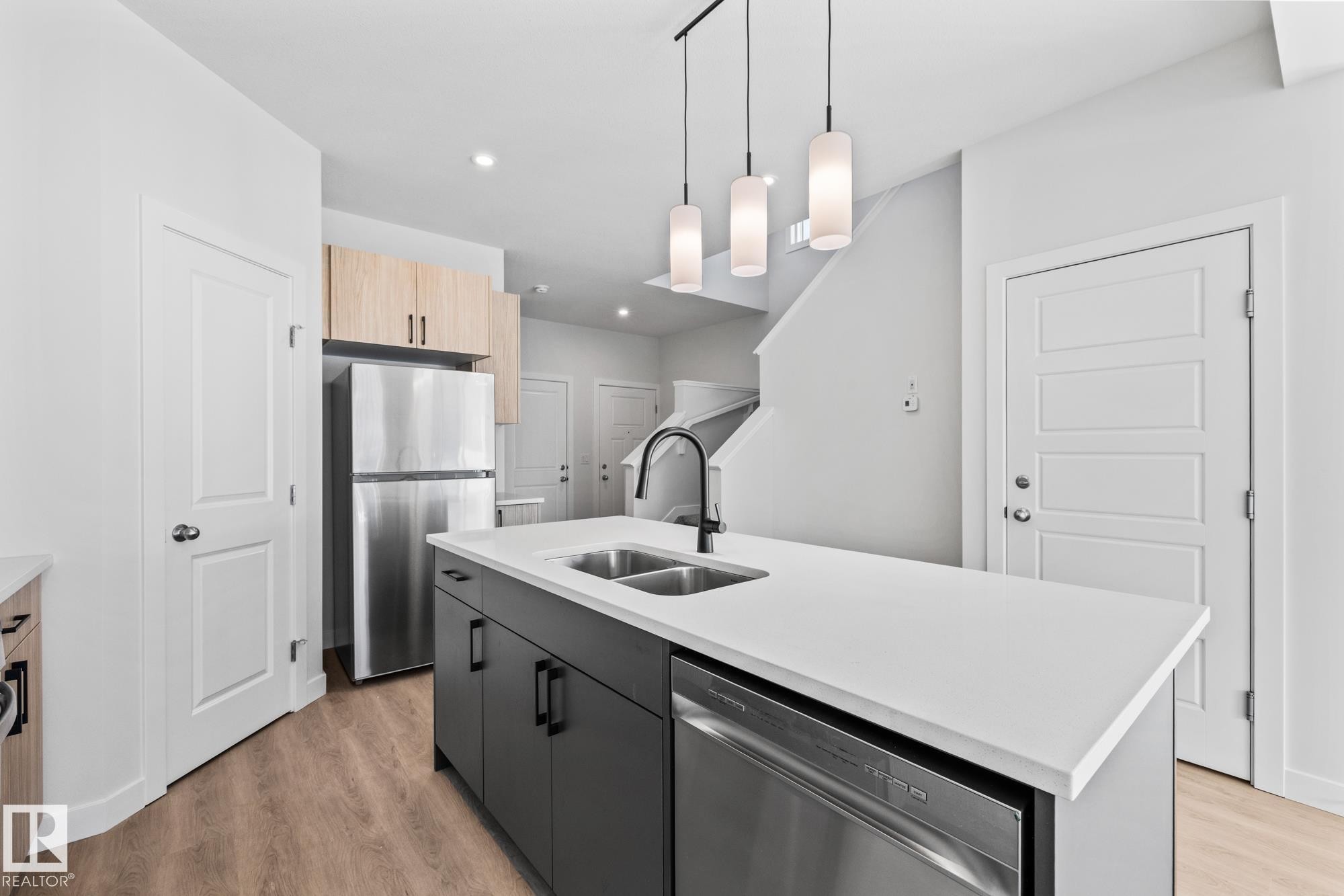 144 Honeysuckle Green, Leduc, AB - Indoor Photo Showing Kitchen With Double Sink