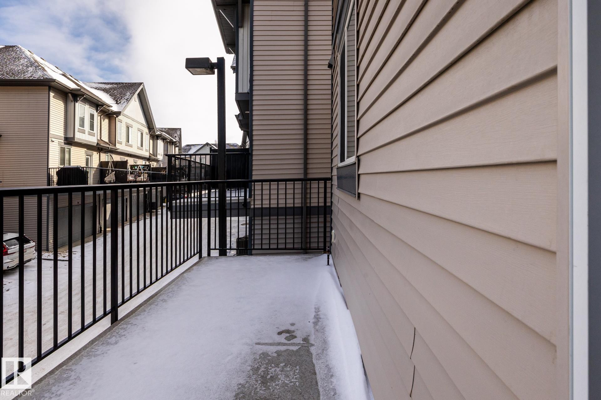 Balcony with a residential view - 21 655 Watt Boulevard, Edmonton, AB - Outdoor With Exterior