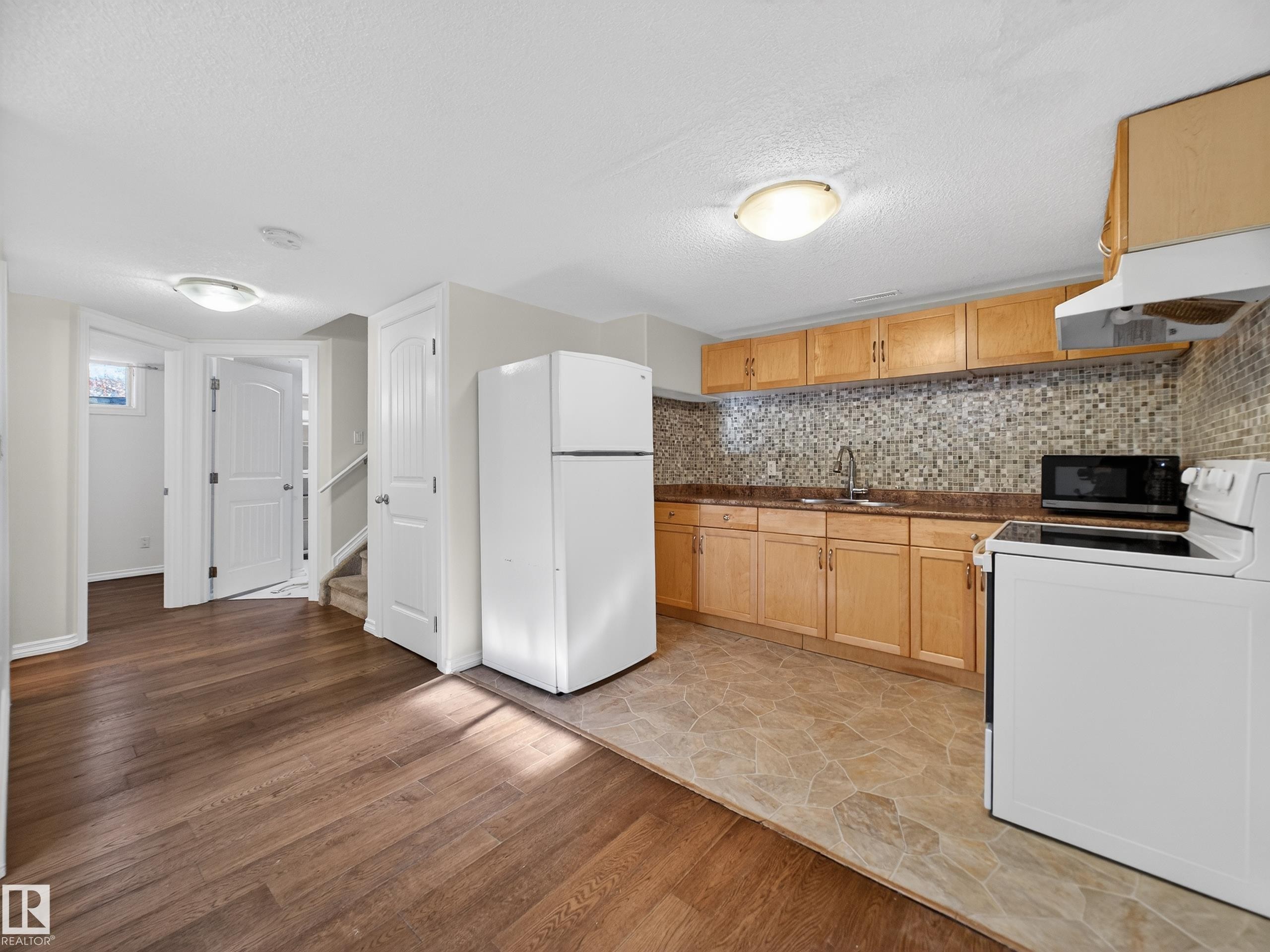 11933 77 Street, Edmonton, AB - Indoor Photo Showing Kitchen With Double Sink