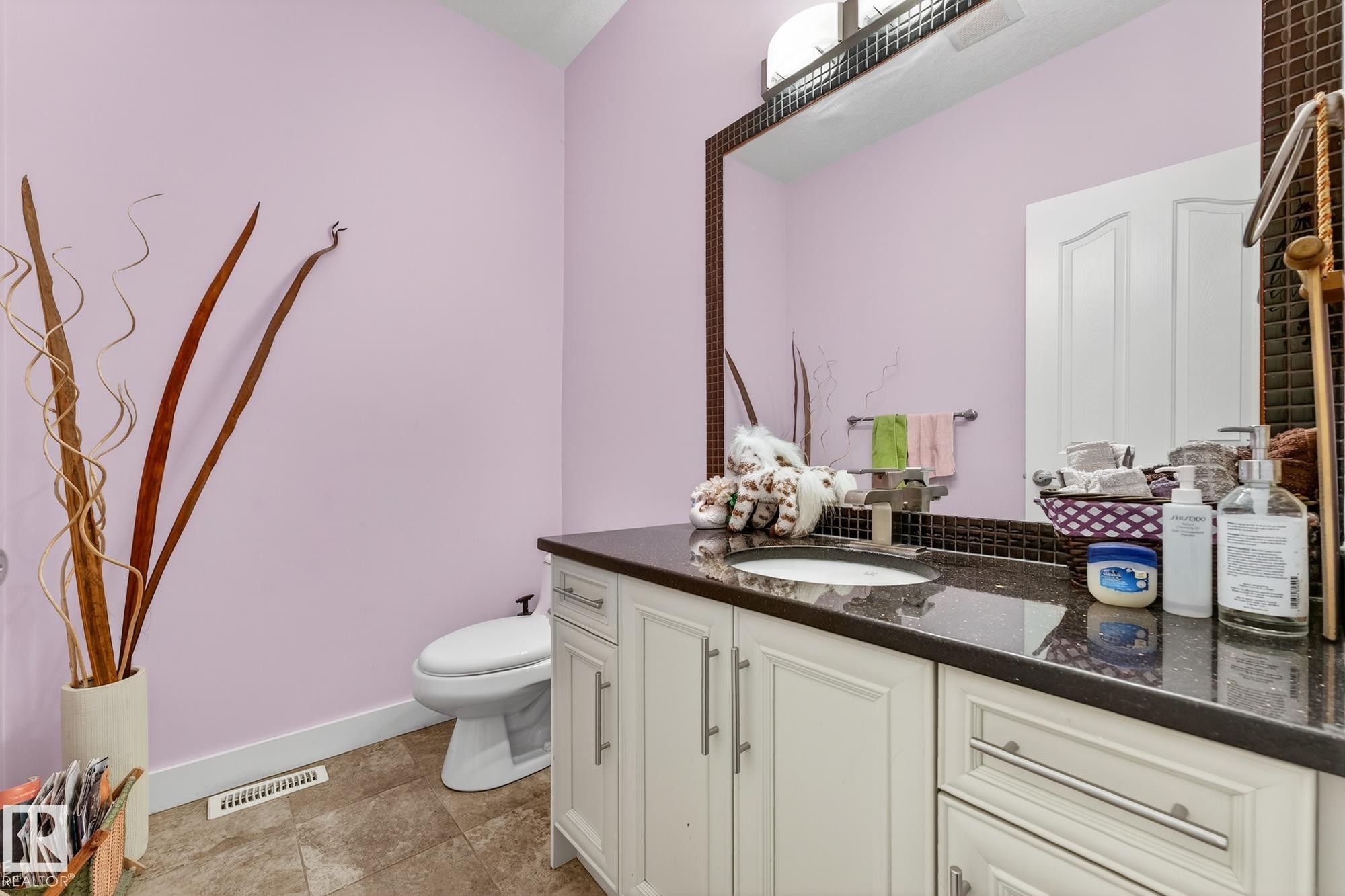 Bathroom featuring toilet and vanity - 1660 Malone Way, Edmonton, AB - Indoor Photo Showing Bathroom