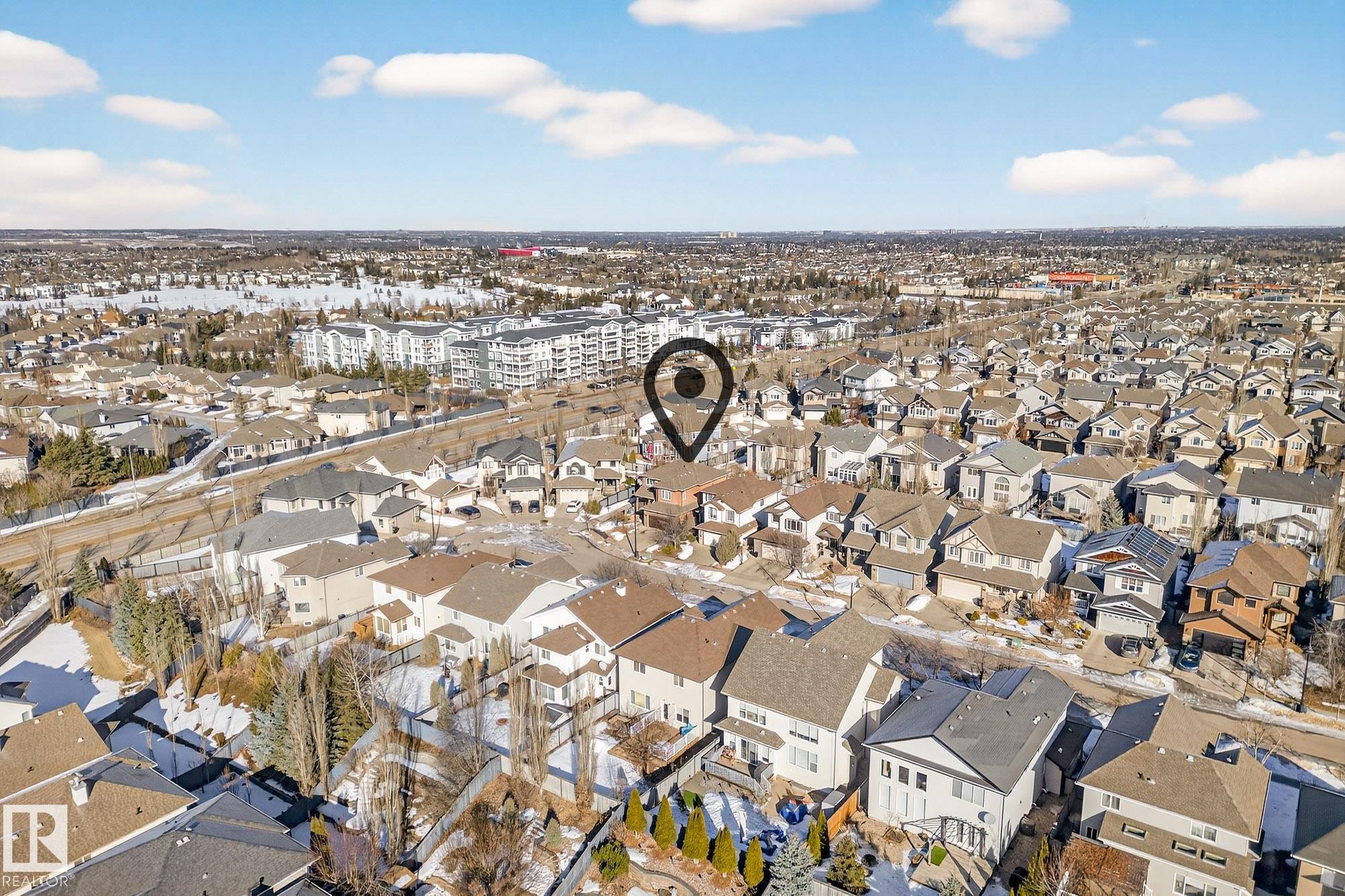 Aerial view of property and surrounding area featuring nearby suburban area - 1660 Malone Way, Edmonton, AB - Outdoor With View