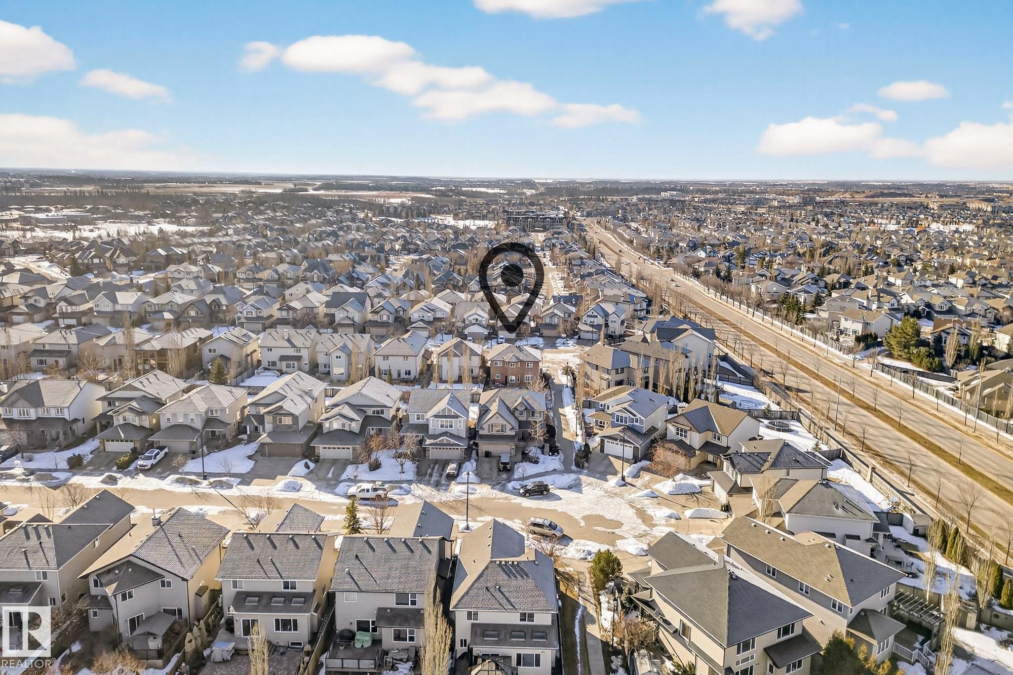 Aerial perspective of suburban area - 1660 Malone Way, Edmonton, AB - Outdoor With View