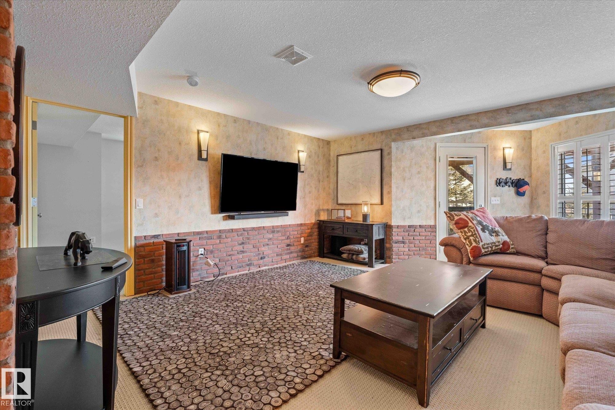 68 Greystone Crescent, Spruce Grove, AB - Indoor Photo Showing Living Room With Fireplace