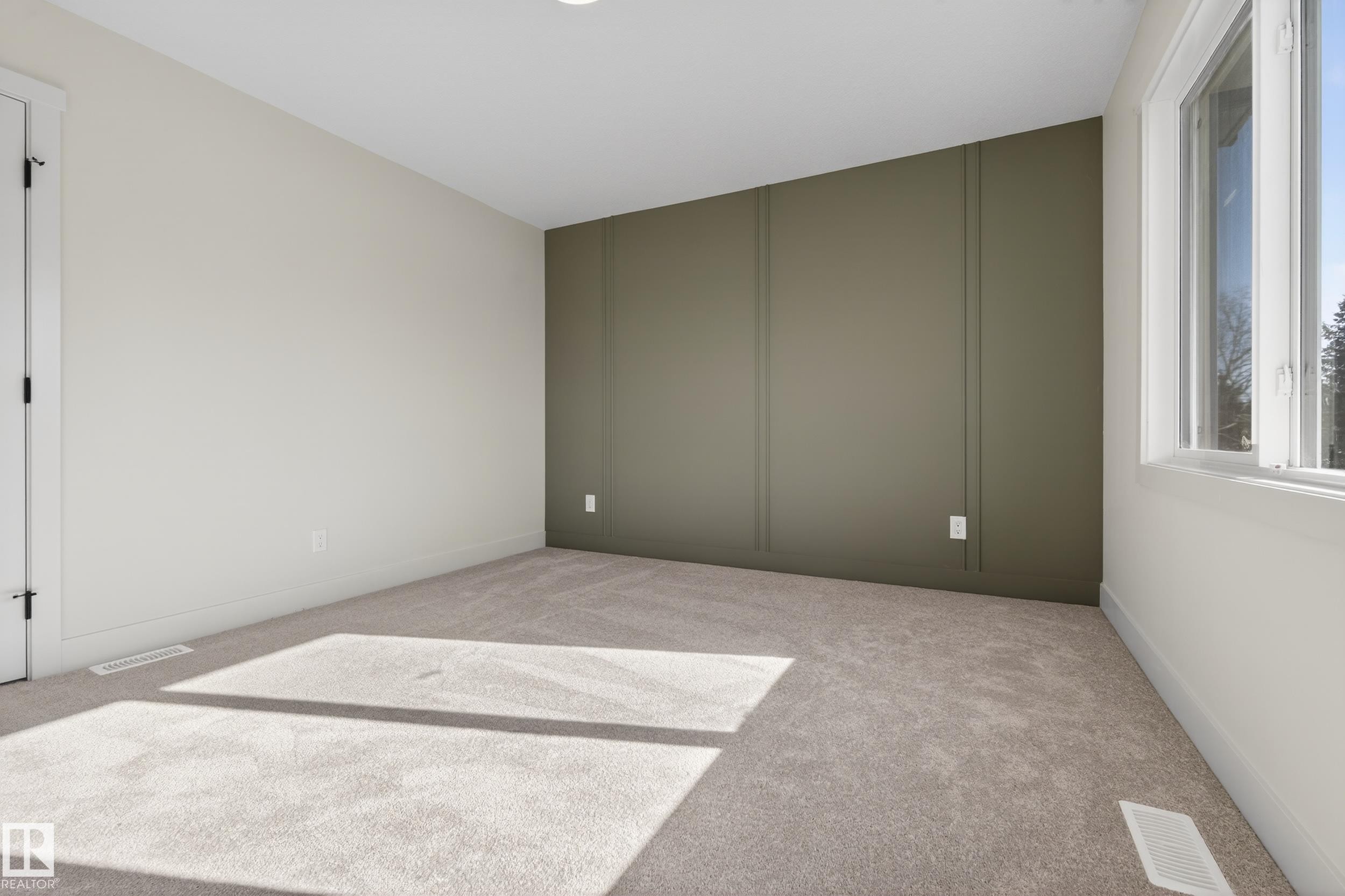 Unfurnished bedroom featuring light carpet - 22 Grayson Green, Stony Plain, AB - Indoor Photo Showing Other Room