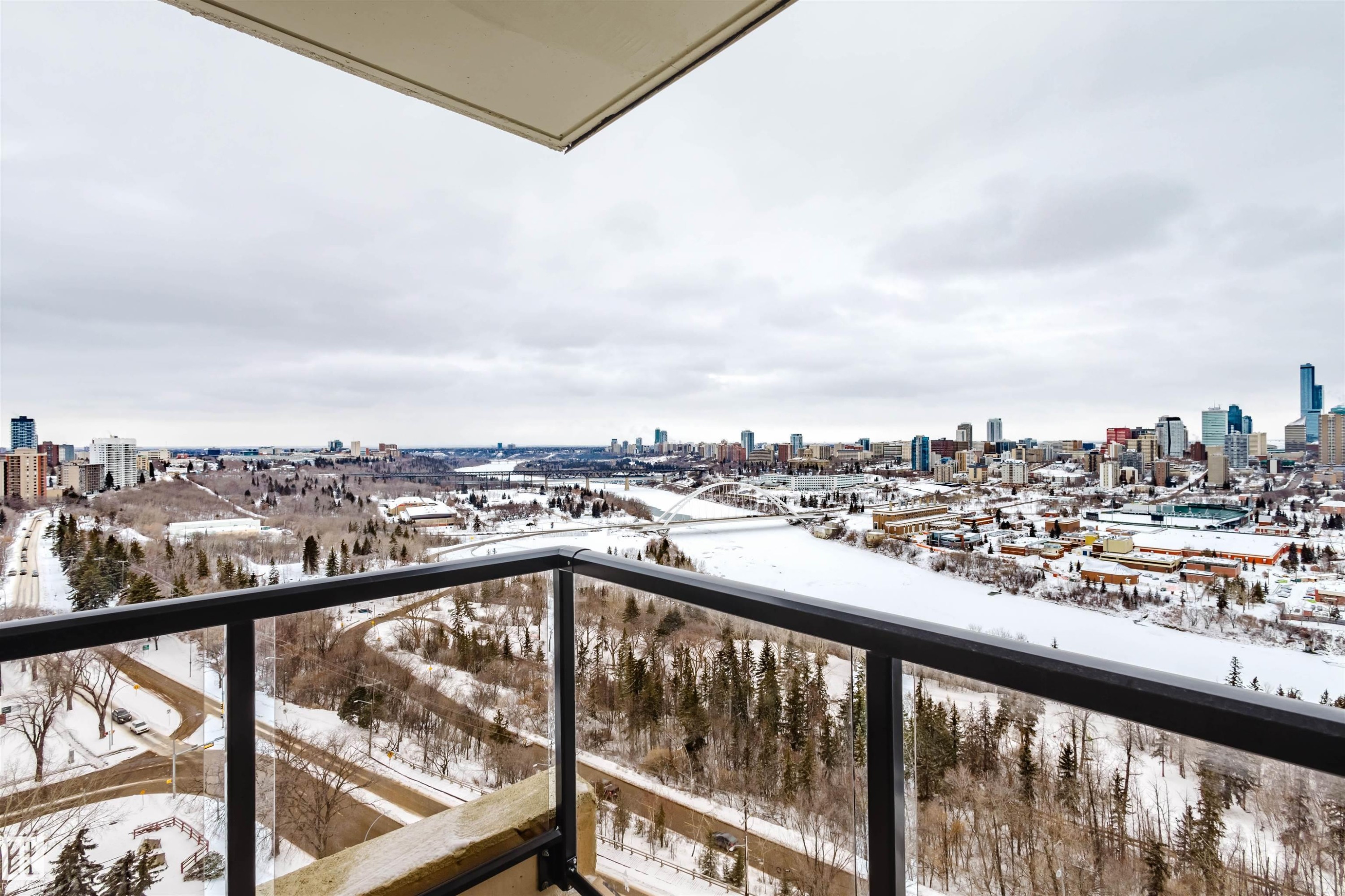 Snow covered back of property with a city view - 1803 10149 Saskatchewan Drive, Edmonton, AB - Outdoor With View