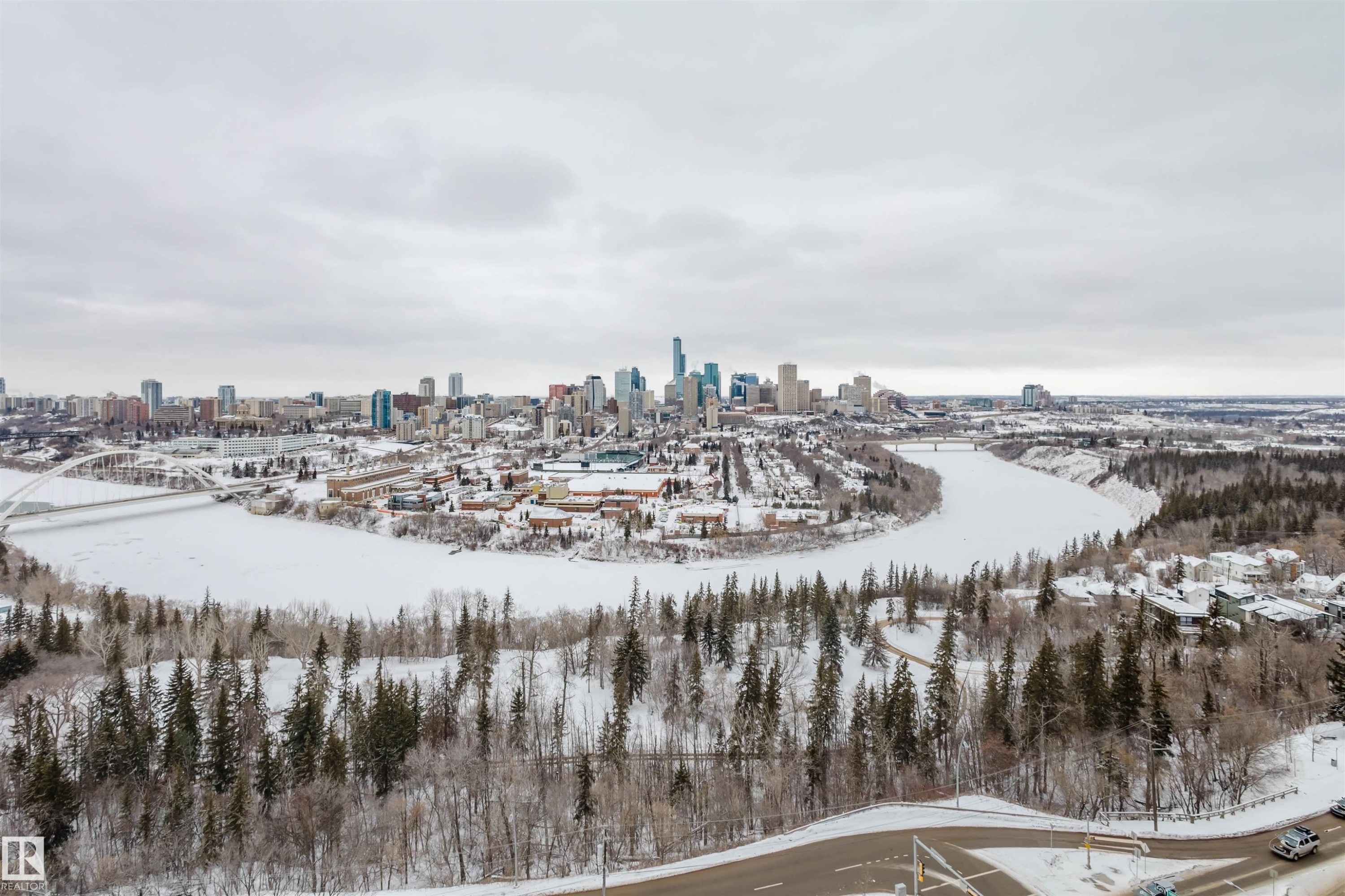 Snowy aerial view featuring a skyline view - 1803 10149 Saskatchewan Drive, Edmonton, AB - Outdoor With View