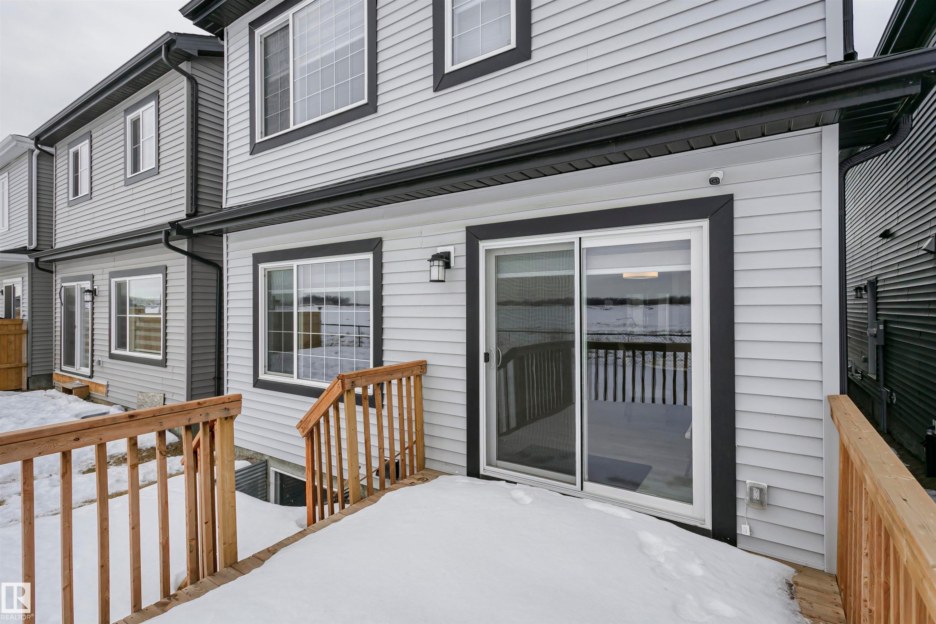 View of snow covered deck - 9421 Pear Crescent, Edmonton, AB - Outdoor With Deck Patio Veranda With Exterior