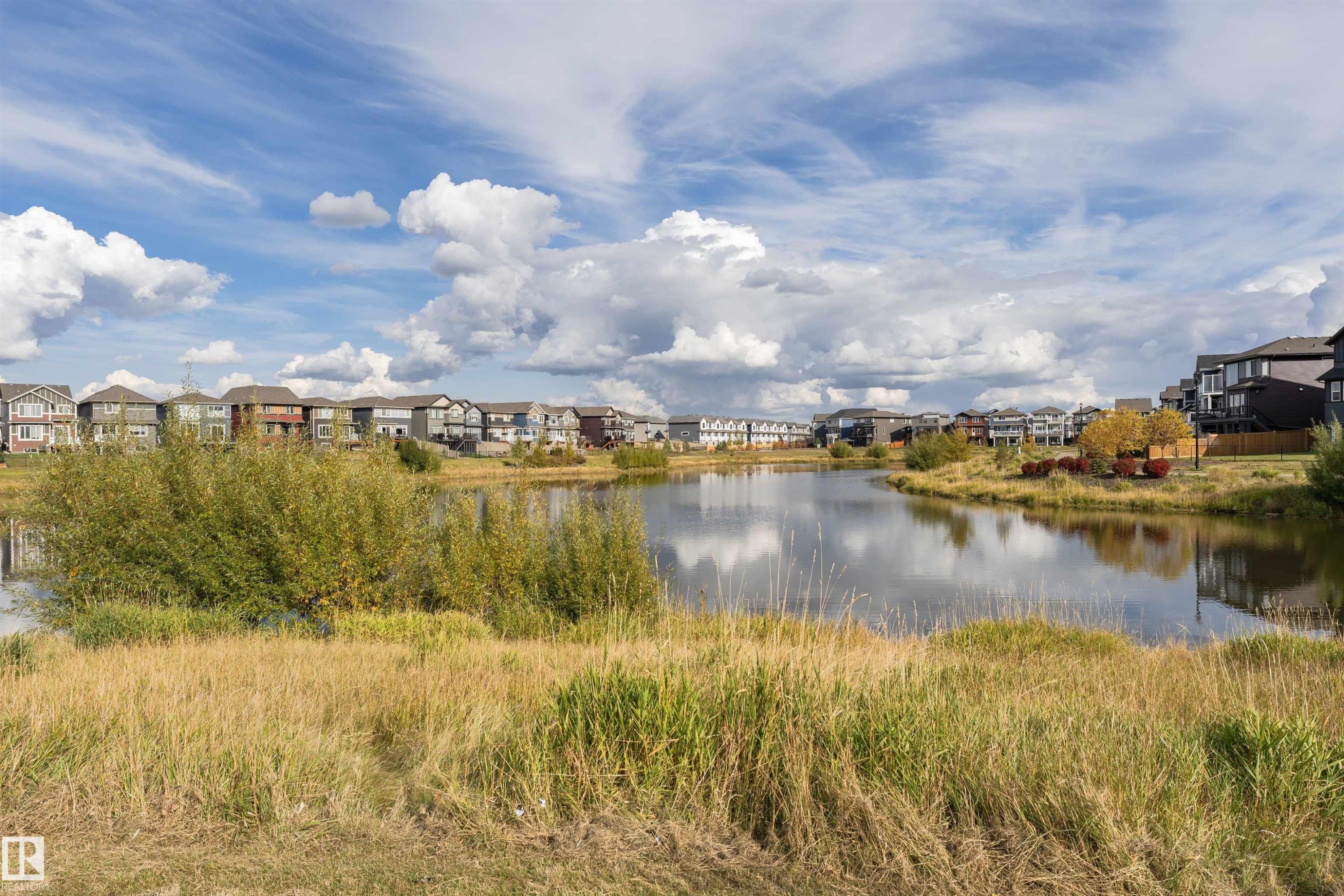 Water view with nearby suburban area - 9421 Pear Crescent, Edmonton, AB - Outdoor With Body Of Water With View