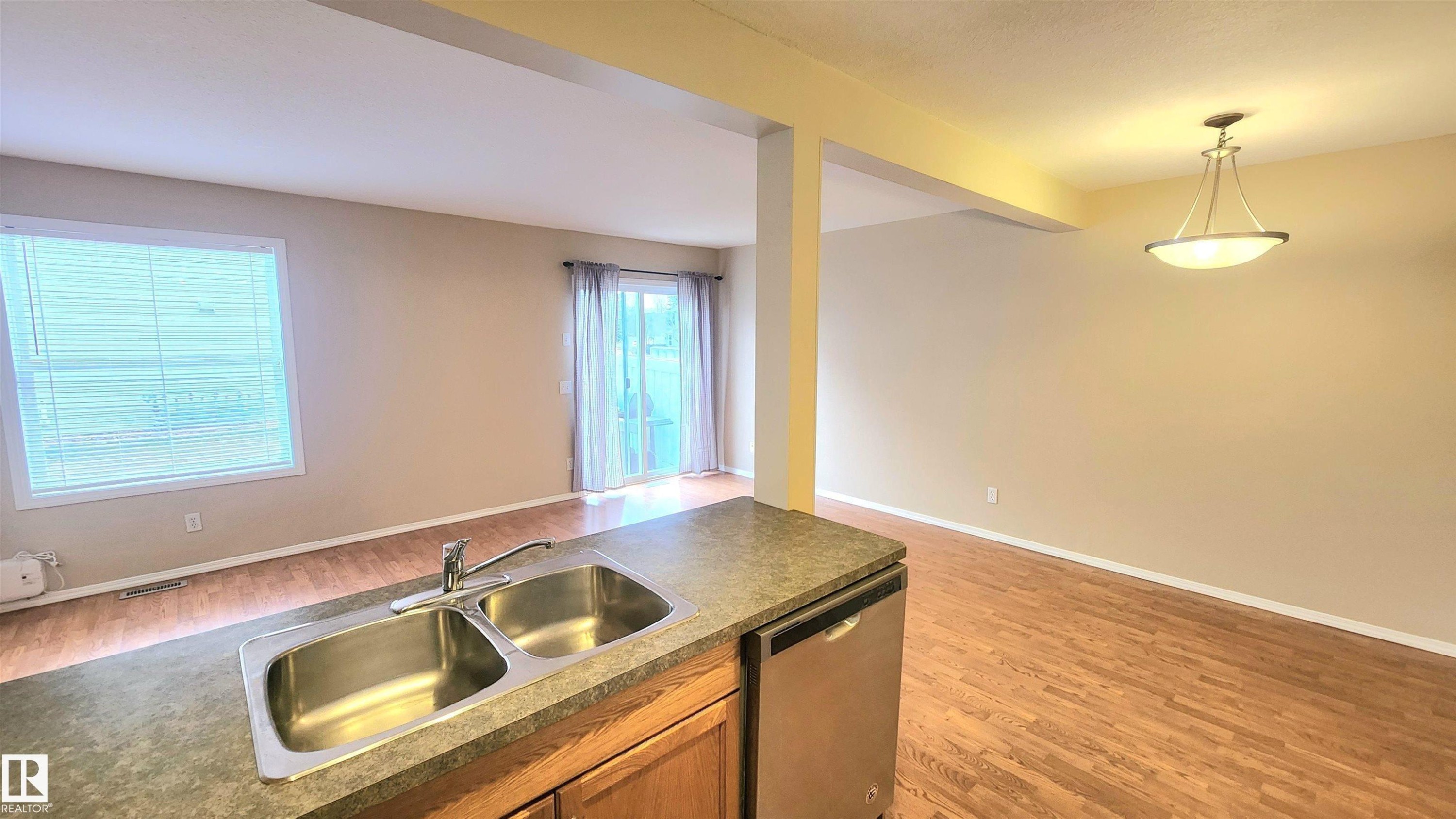 181 230 Edwards Drive, Edmonton, AB - Indoor Photo Showing Kitchen With Double Sink