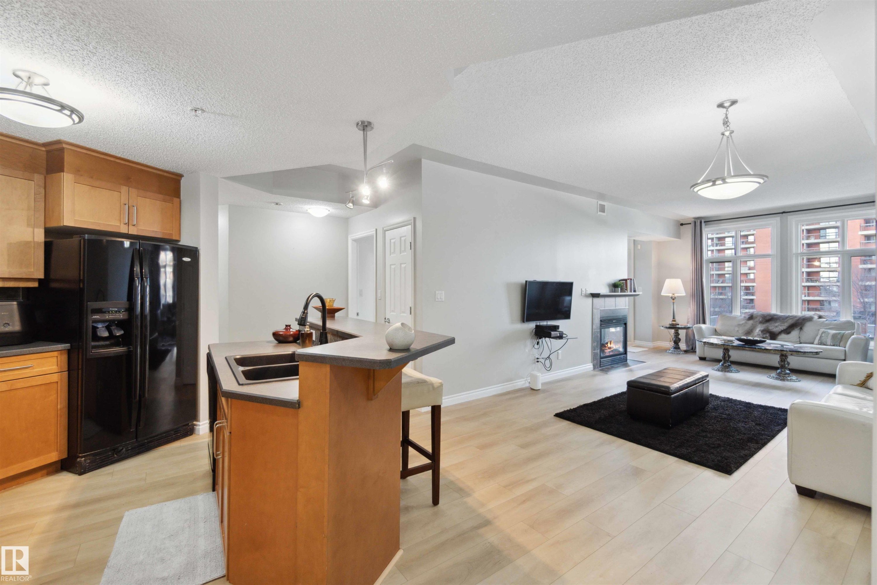 402 9020 Jasper Avenue, Edmonton, AB - Indoor With Fireplace