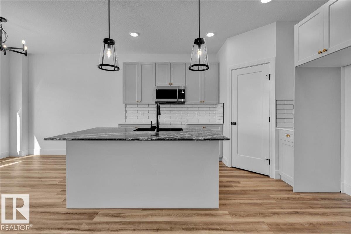 70 Sumac Close, Fort Saskatchewan, AB - Indoor Photo Showing Kitchen With Upgraded Kitchen