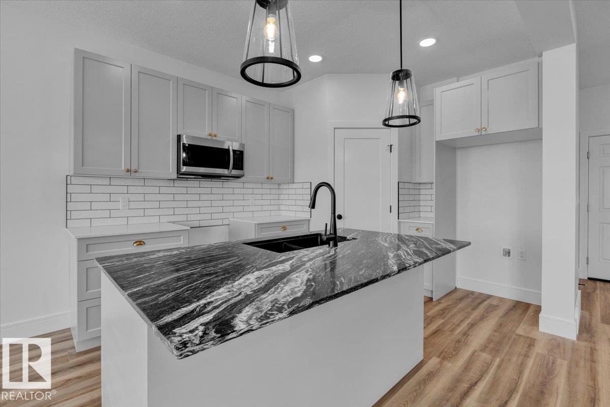 70 Sumac Close, Fort Saskatchewan, AB - Indoor Photo Showing Kitchen With Double Sink With Upgraded Kitchen