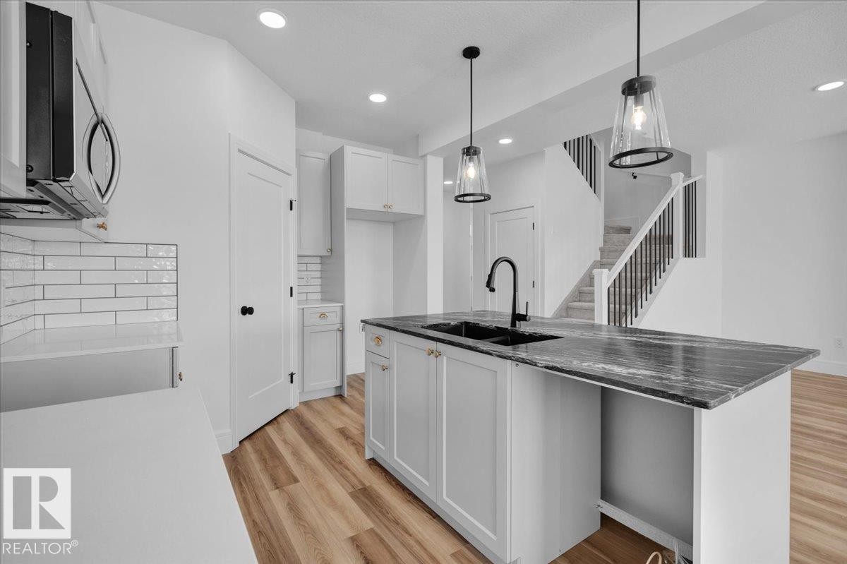 70 Sumac Close, Fort Saskatchewan, AB - Indoor Photo Showing Kitchen With Double Sink With Upgraded Kitchen