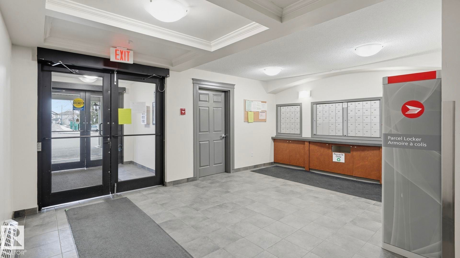 Building lobby with crown molding - 401 636 Mcallister Loop, Edmonton, AB - Indoor