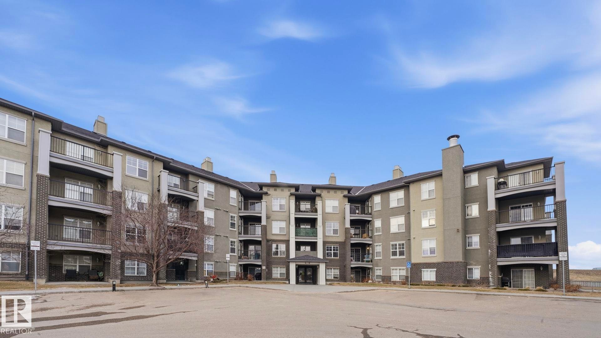 View of apartment building / complex - 401 636 Mcallister Loop, Edmonton, AB - Outdoor With Balcony With Facade