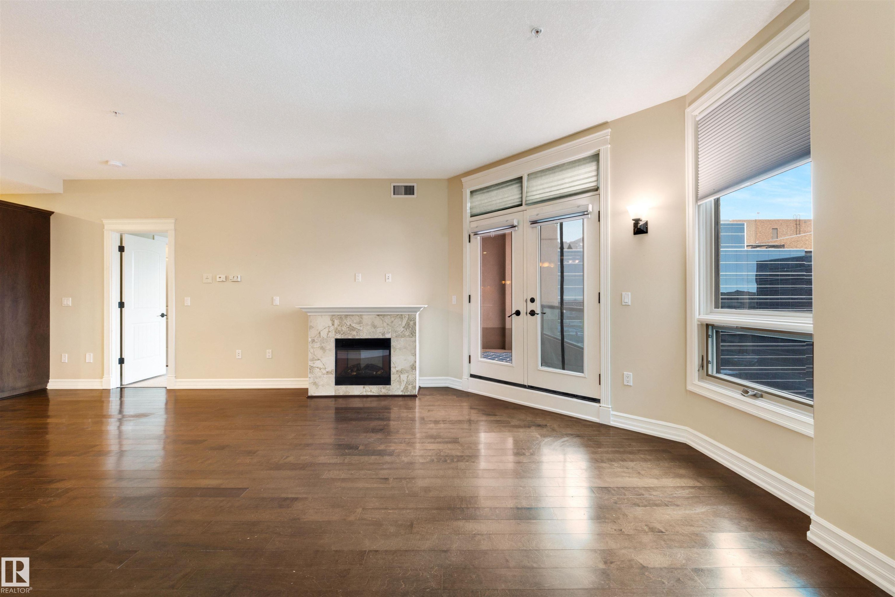 906 10142 111 Street, Edmonton, AB - Indoor Photo Showing Other Room With Fireplace