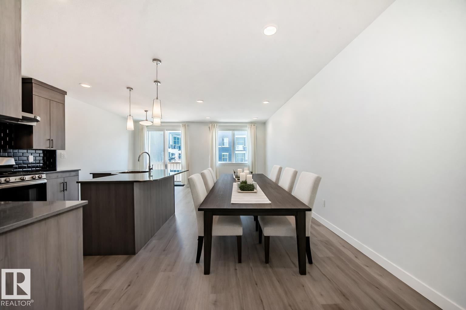 Dining area featuring light wood-style flooring and recessed lighting - 2282 Chokecherry Close, Edmonton, AB - Indoor Photo Showing Other Room