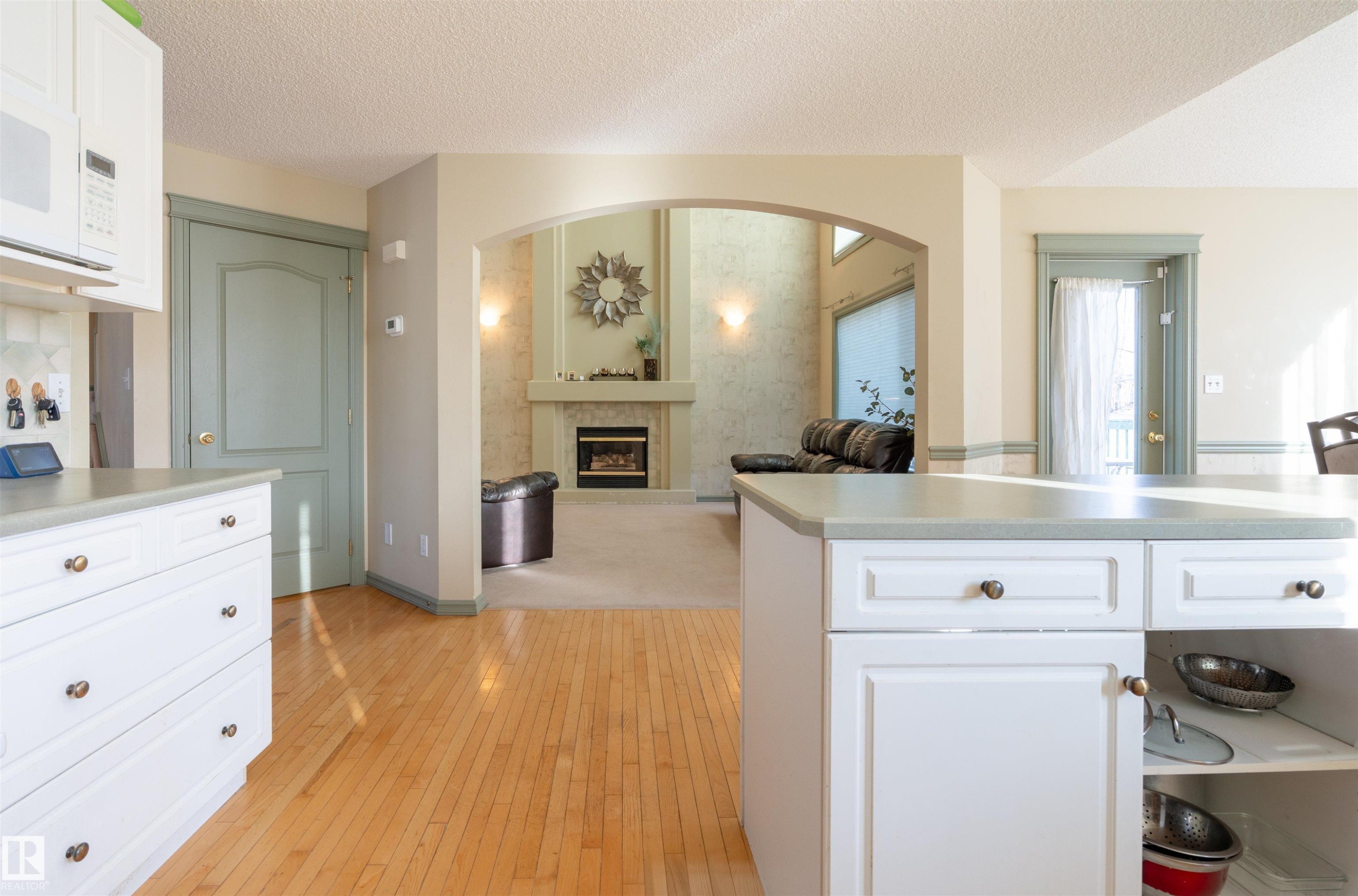 11813 12 Avenue, Edmonton, AB - Indoor Photo Showing Kitchen With Fireplace