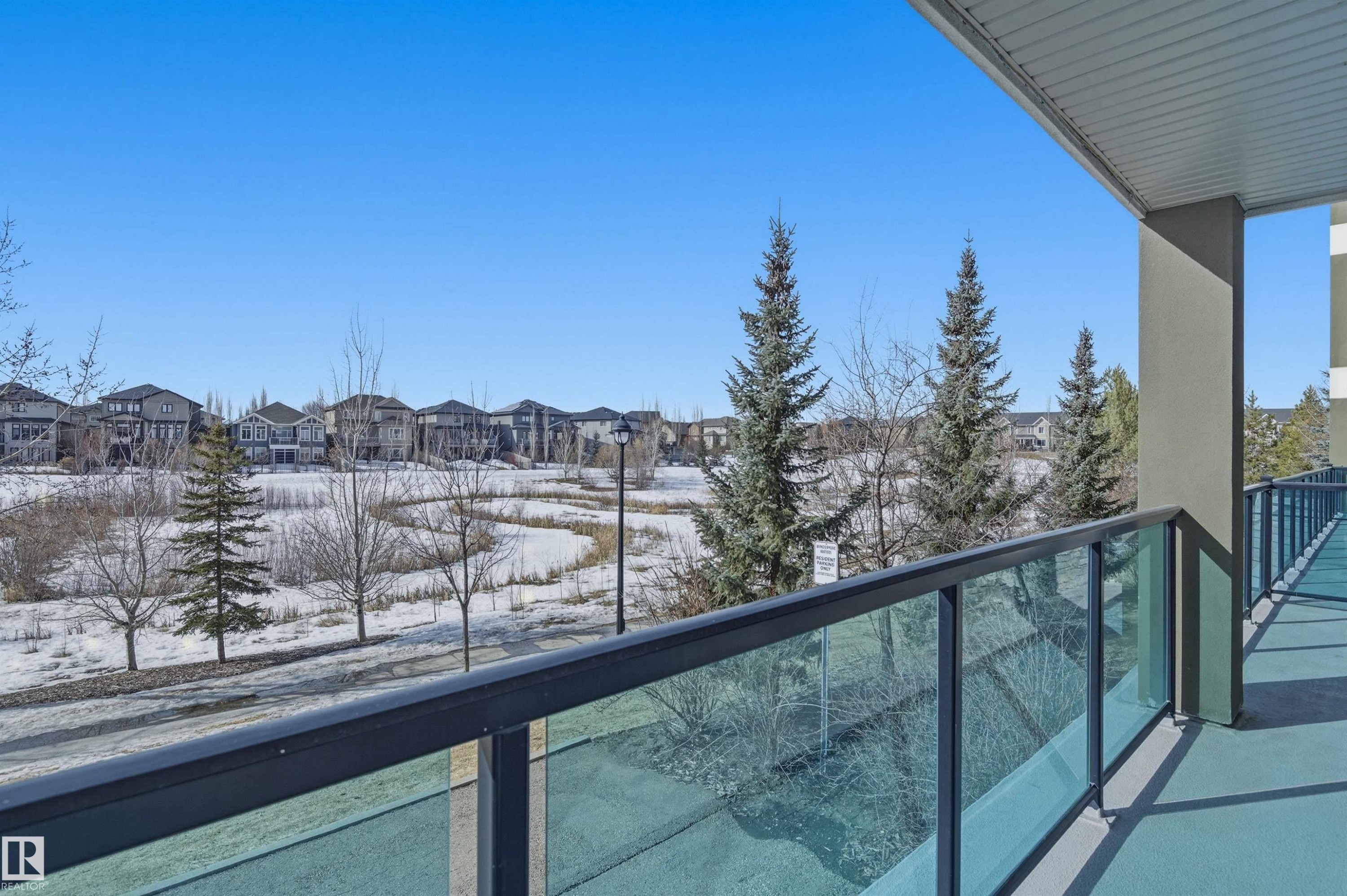 Balcony with a residential view - 106 1238 Windermere Way, Edmonton, AB - Outdoor With Balcony With View