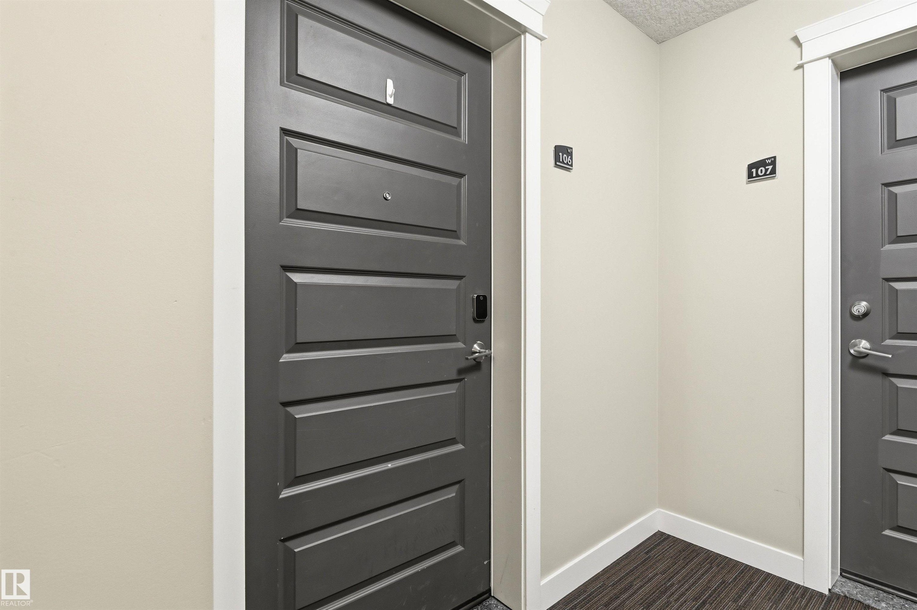 Doorway to property - 106 1238 Windermere Way, Edmonton, AB - Indoor Photo Showing Other Room