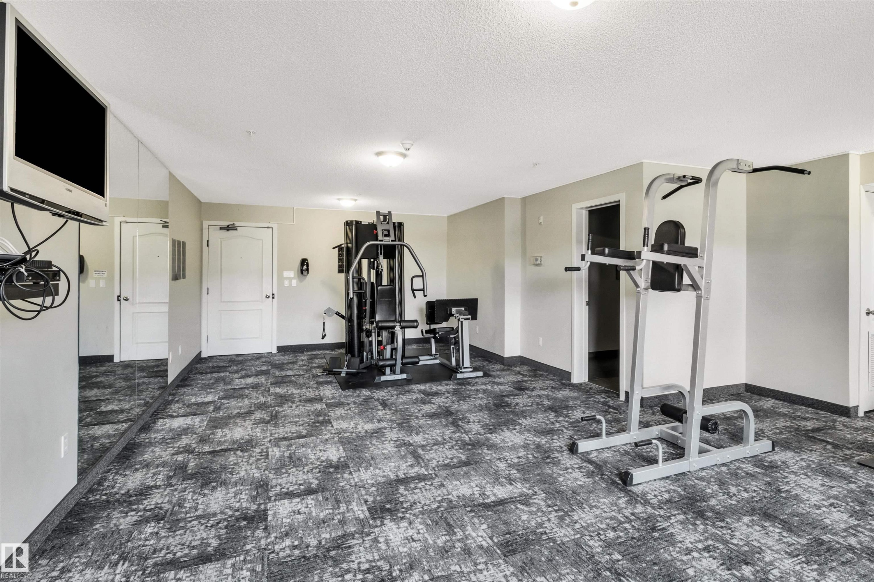 215 392 Silver Berry Road, Edmonton, AB - Indoor Photo Showing Gym Room