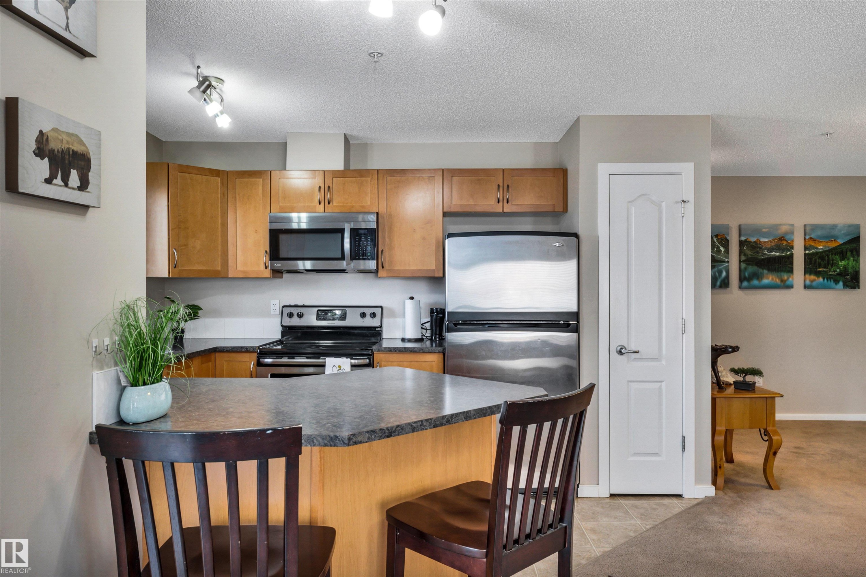 215 392 Silver Berry Road, Edmonton, AB - Indoor Photo Showing Kitchen With Stainless Steel Kitchen With Double Sink