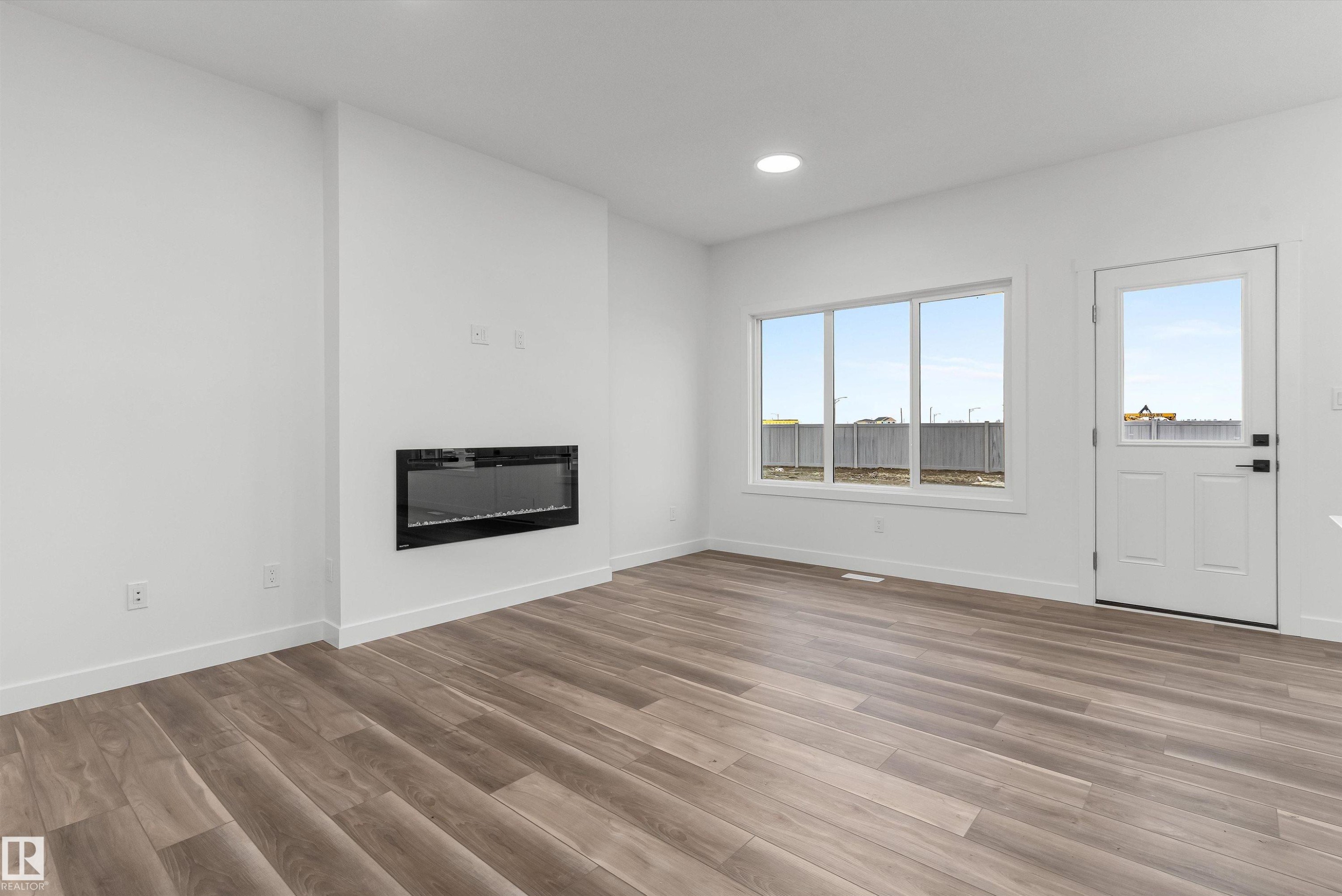 19131 20 Avenue, Edmonton, AB - Indoor Photo Showing Living Room With Fireplace