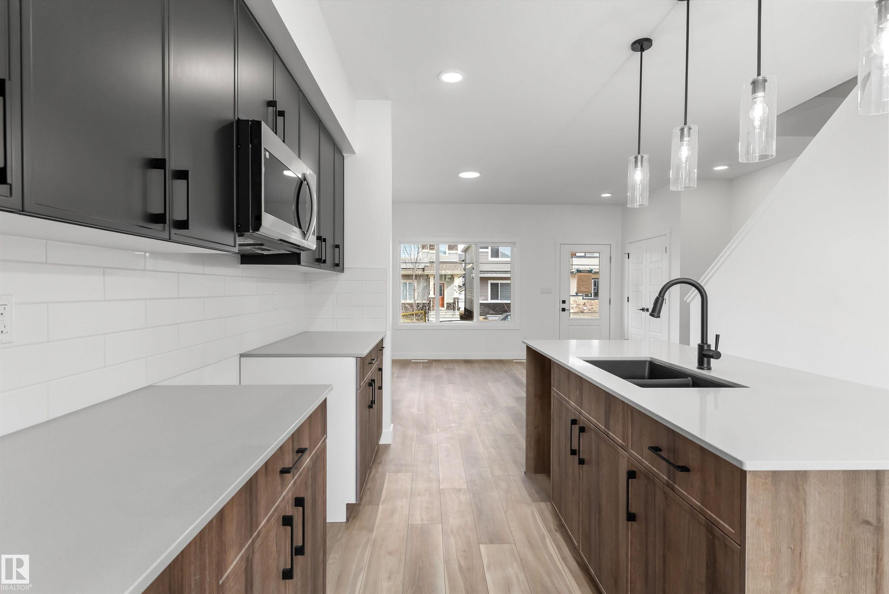 6261 175A Avenue, Edmonton, AB - Indoor Photo Showing Kitchen With Double Sink With Upgraded Kitchen
