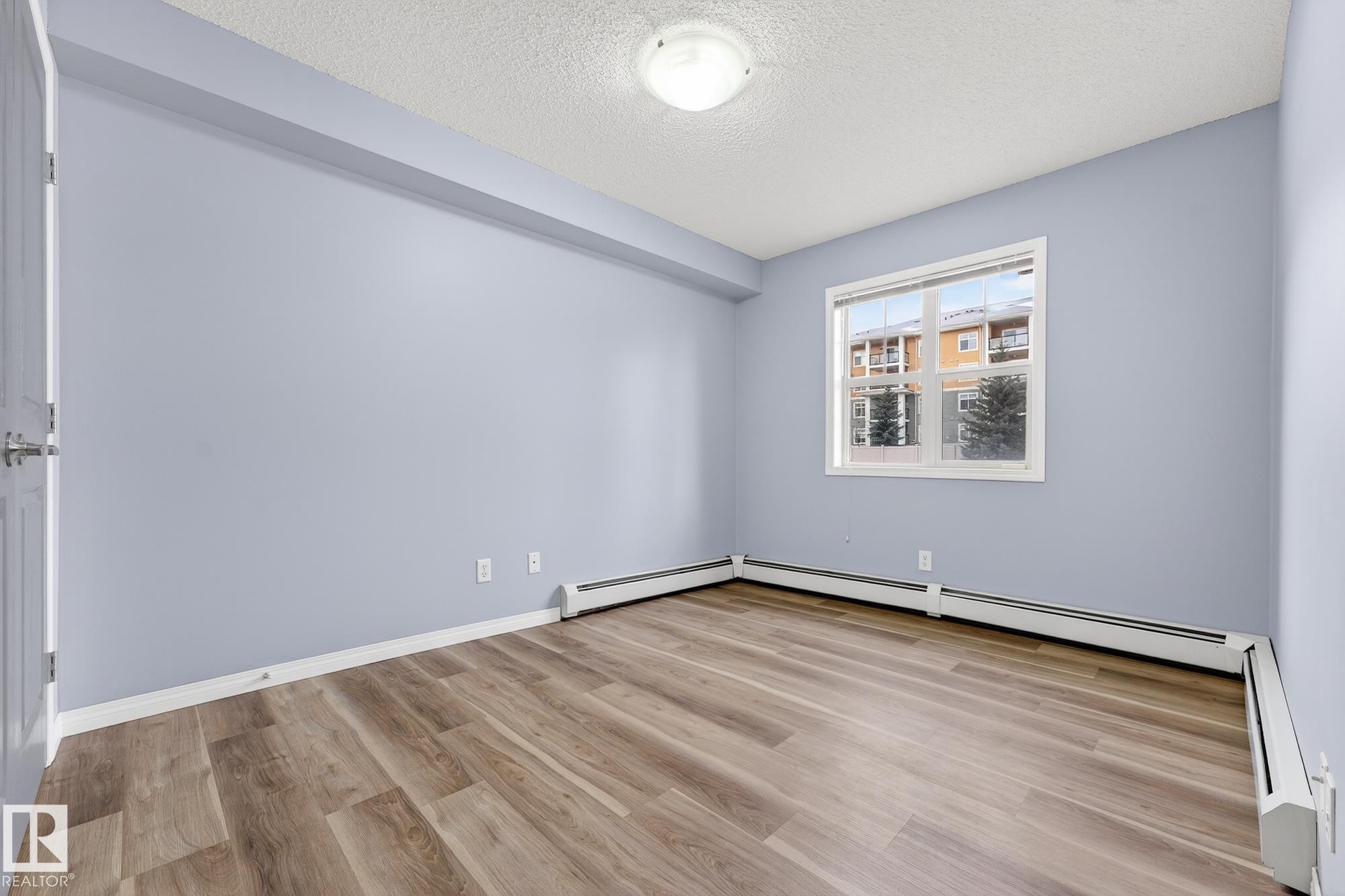102 11445 Ellerslie Road Sw, Edmonton, AB - Indoor Photo Showing Other Room
