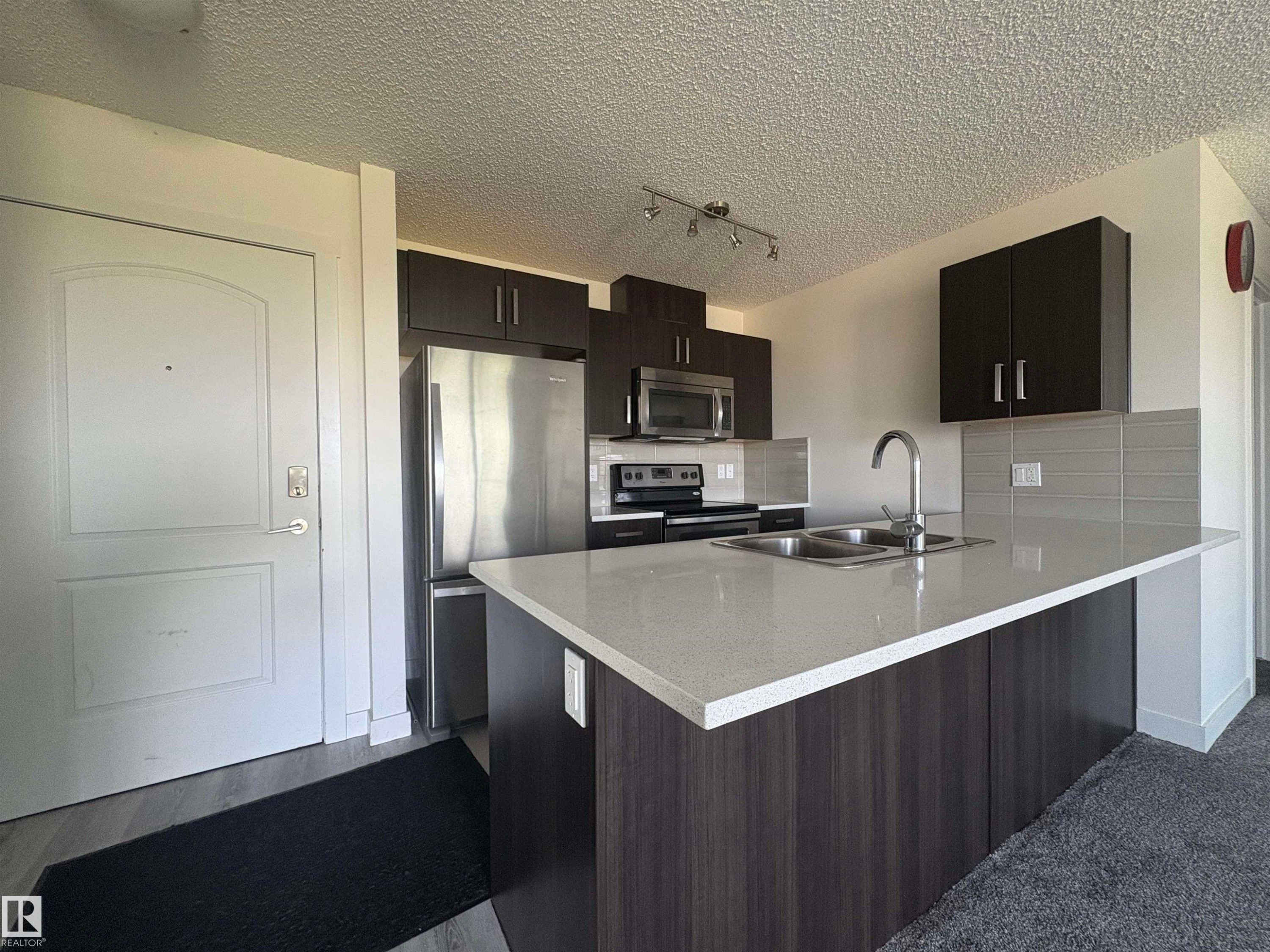 312 667 Watt Boulevard, Edmonton, AB - Indoor Photo Showing Kitchen With Double Sink