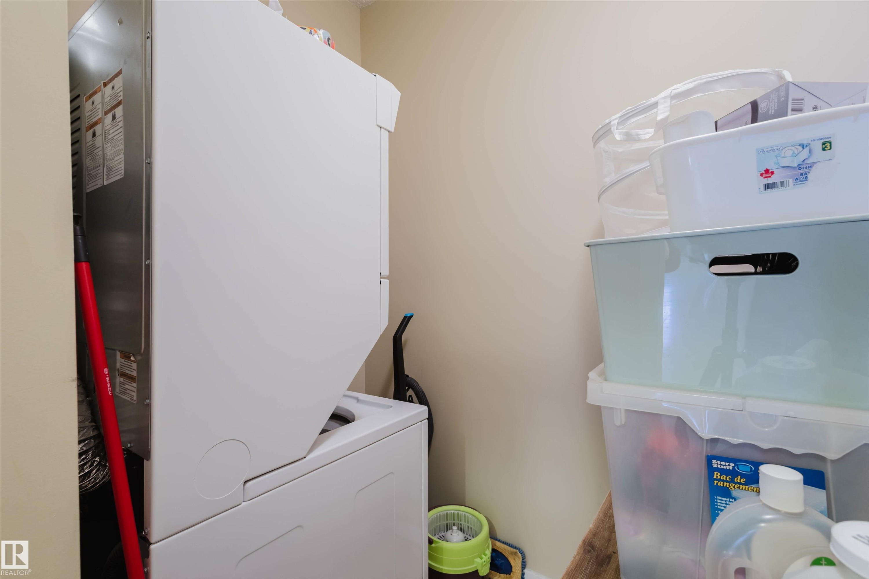 Laundry room featuring heating unit - 207 9910 111 Street, Edmonton, AB - Indoor