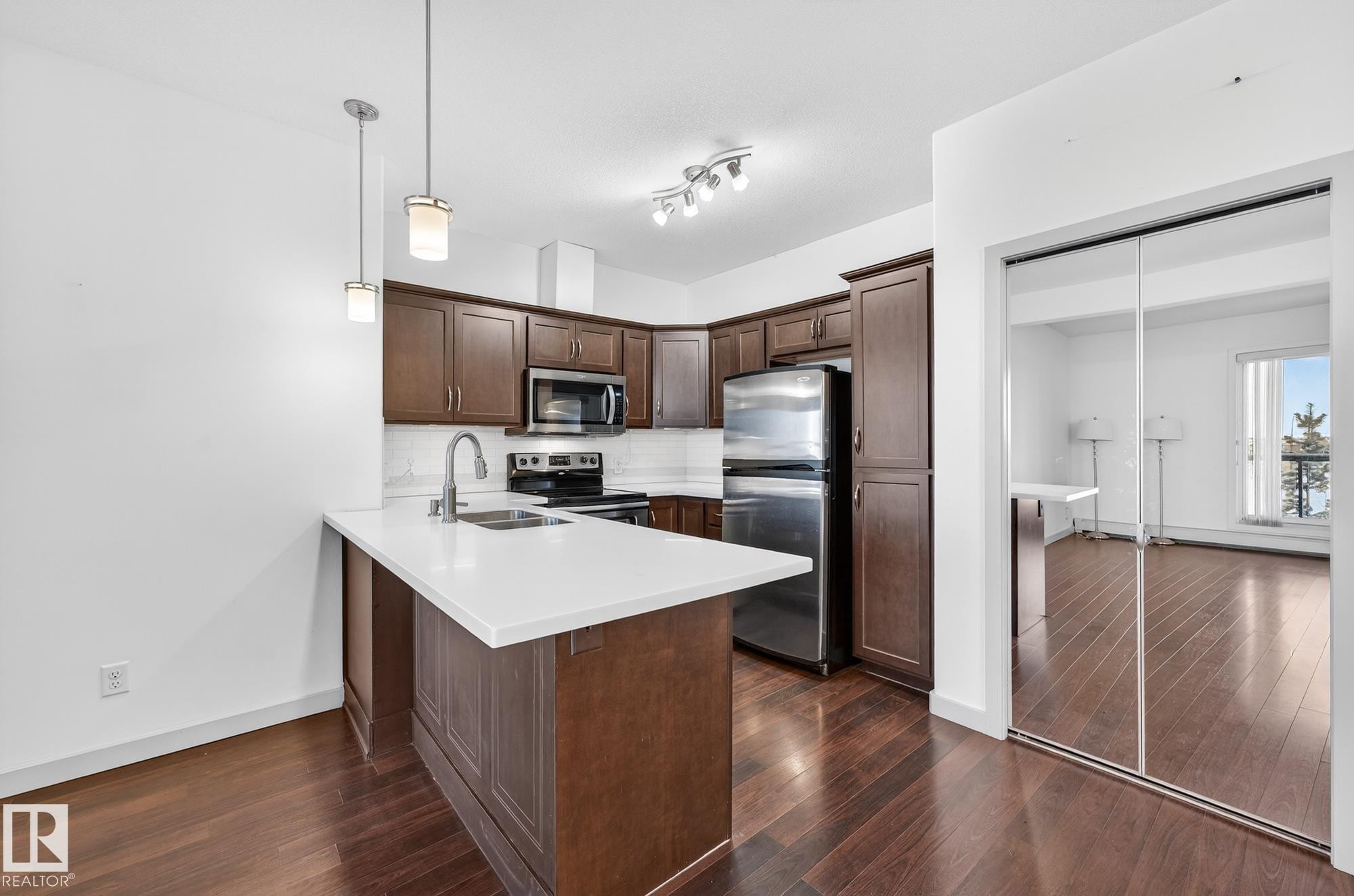 316 304 Ambleside Link, Edmonton, AB - Indoor Photo Showing Kitchen With Double Sink