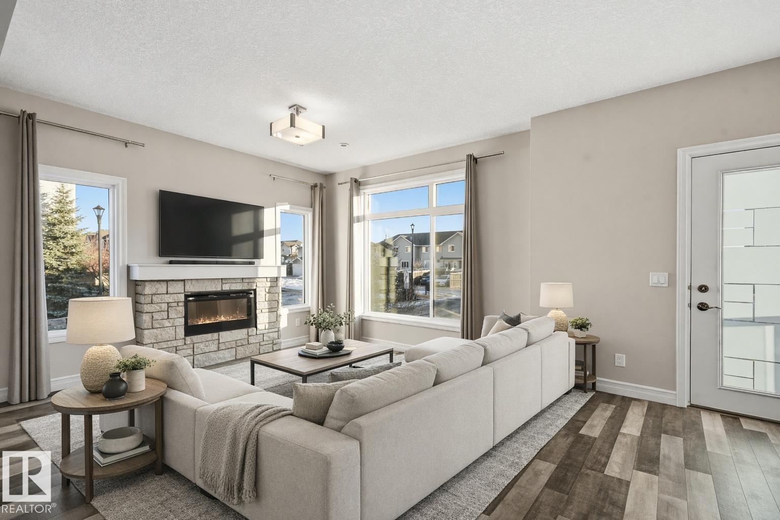Virtually staged living room - 10 804 Welsh Drive, Edmonton, AB - Indoor Photo Showing Living Room With Fireplace