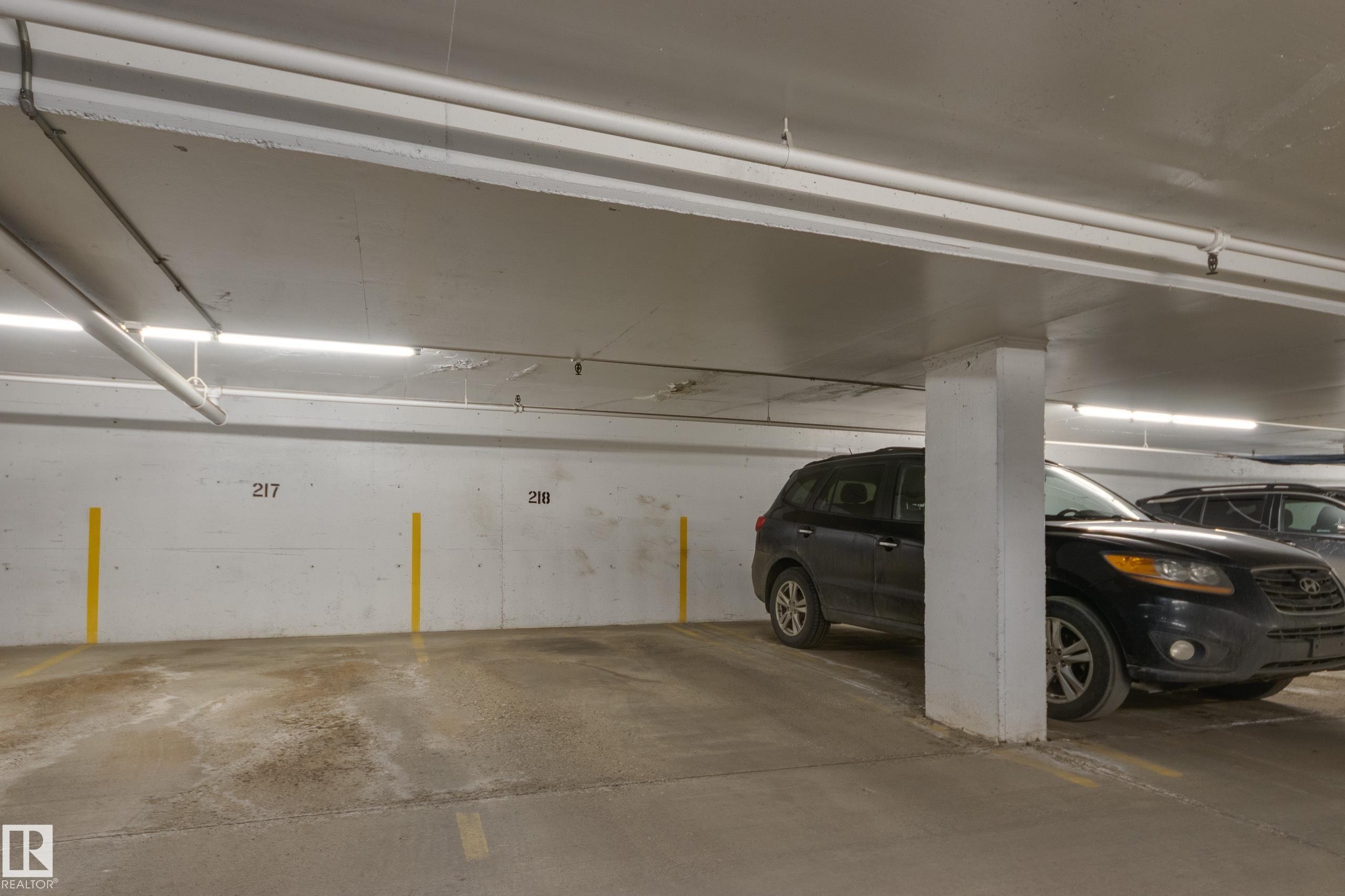 306 12121 Jasper Avenue, Edmonton, AB - Indoor Photo Showing Garage
