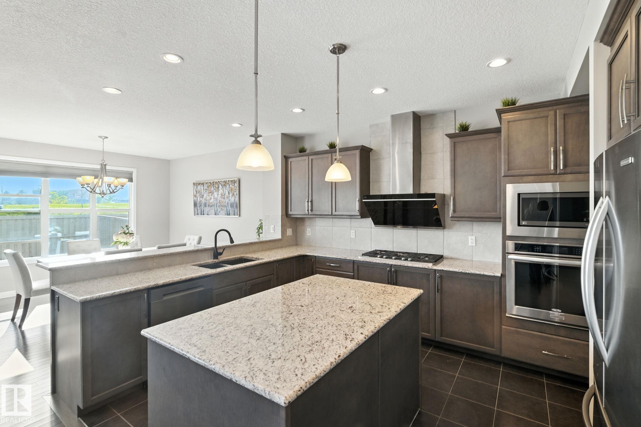 Edmonton, AB - Indoor Photo Showing Kitchen With Upgraded Kitchen