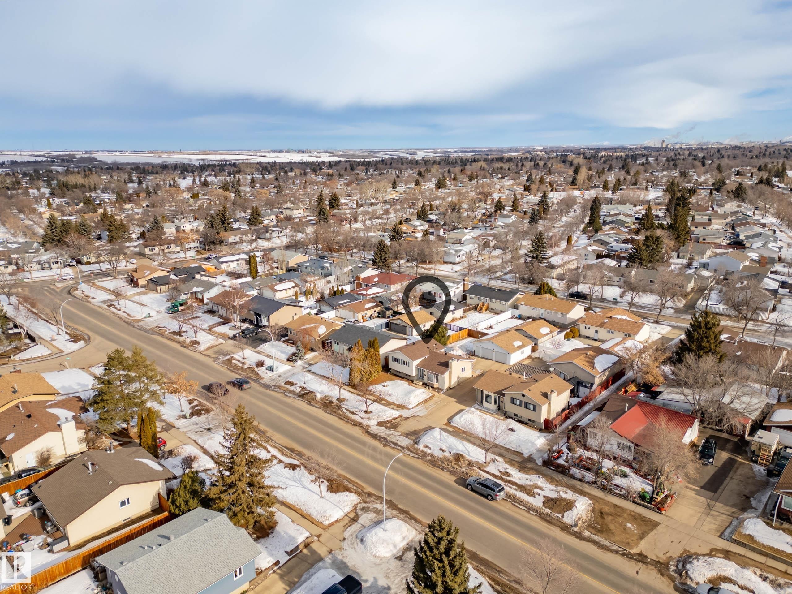 Snowy aerial view with a residential view - 9221 84 Street, Fort Saskatchewan, AB - Outdoor With View
