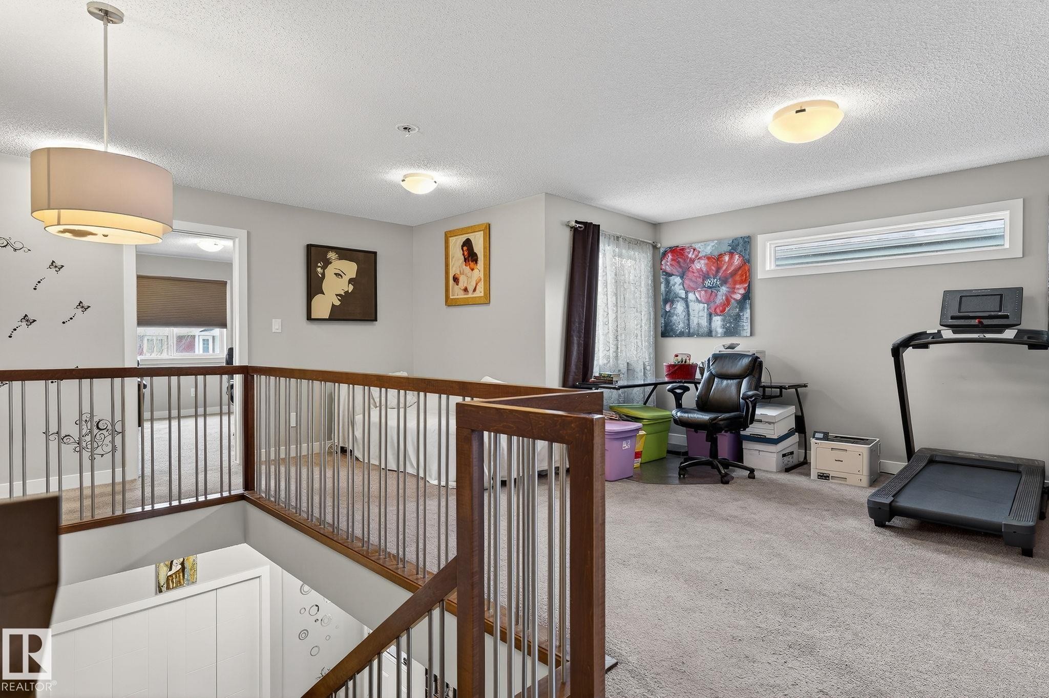 Hall featuring carpet flooring and a textured ceiling - 21867 80 Avenue, Edmonton, AB - Indoor Photo Showing Other Room