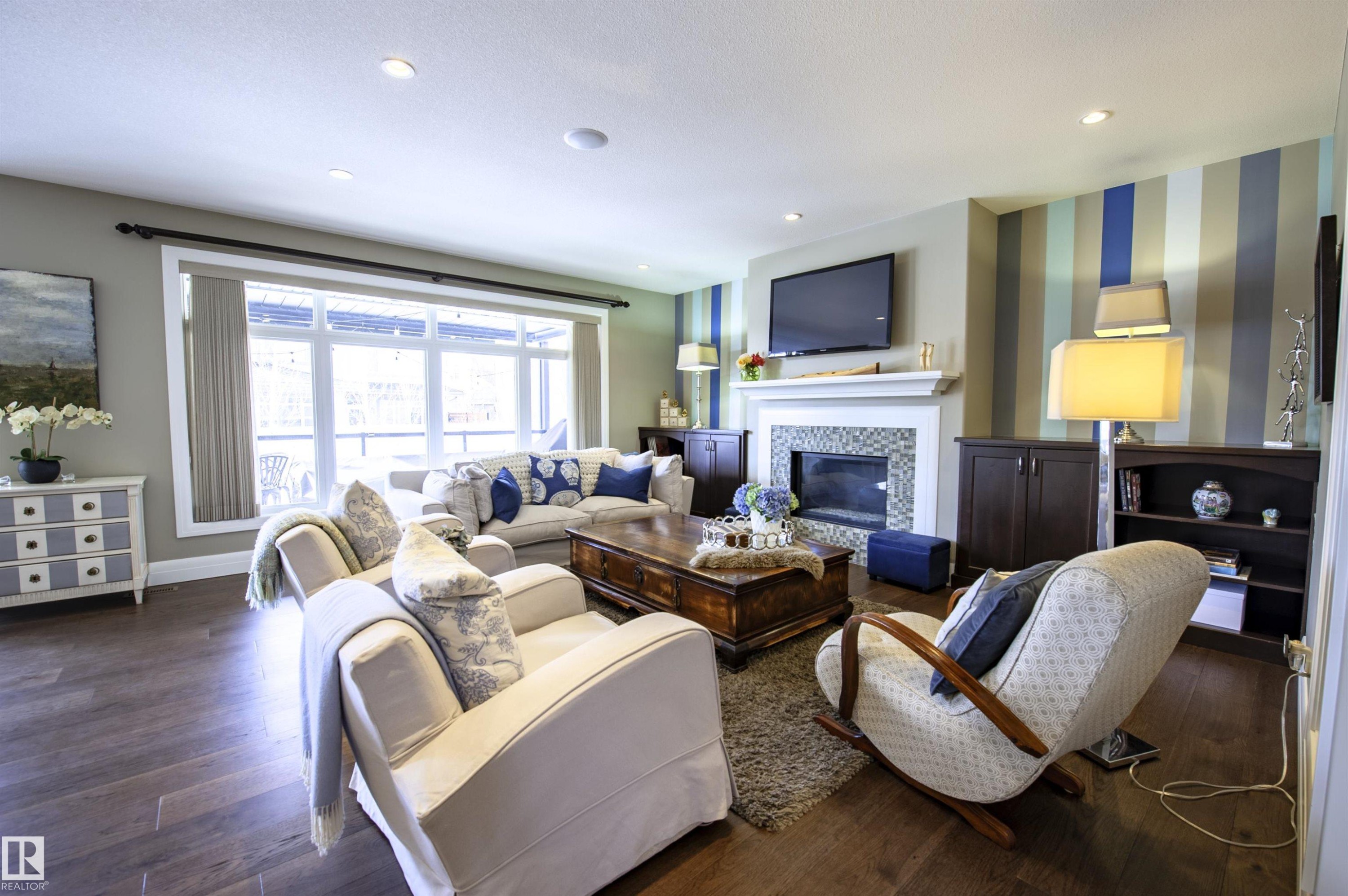 2525 Cameron Ravine Landing, Edmonton, AB - Indoor Photo Showing Living Room With Fireplace
