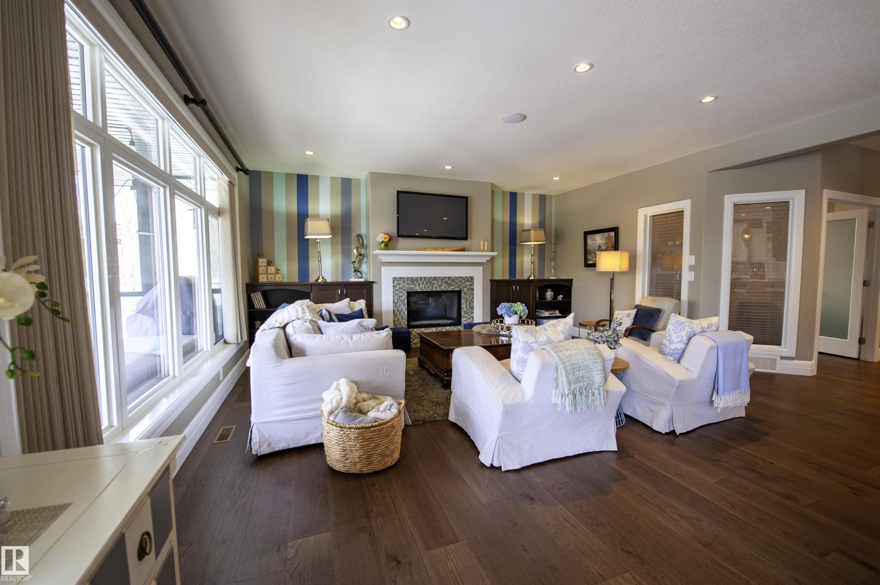 2525 Cameron Ravine Landing, Edmonton, AB - Indoor Photo Showing Living Room With Fireplace