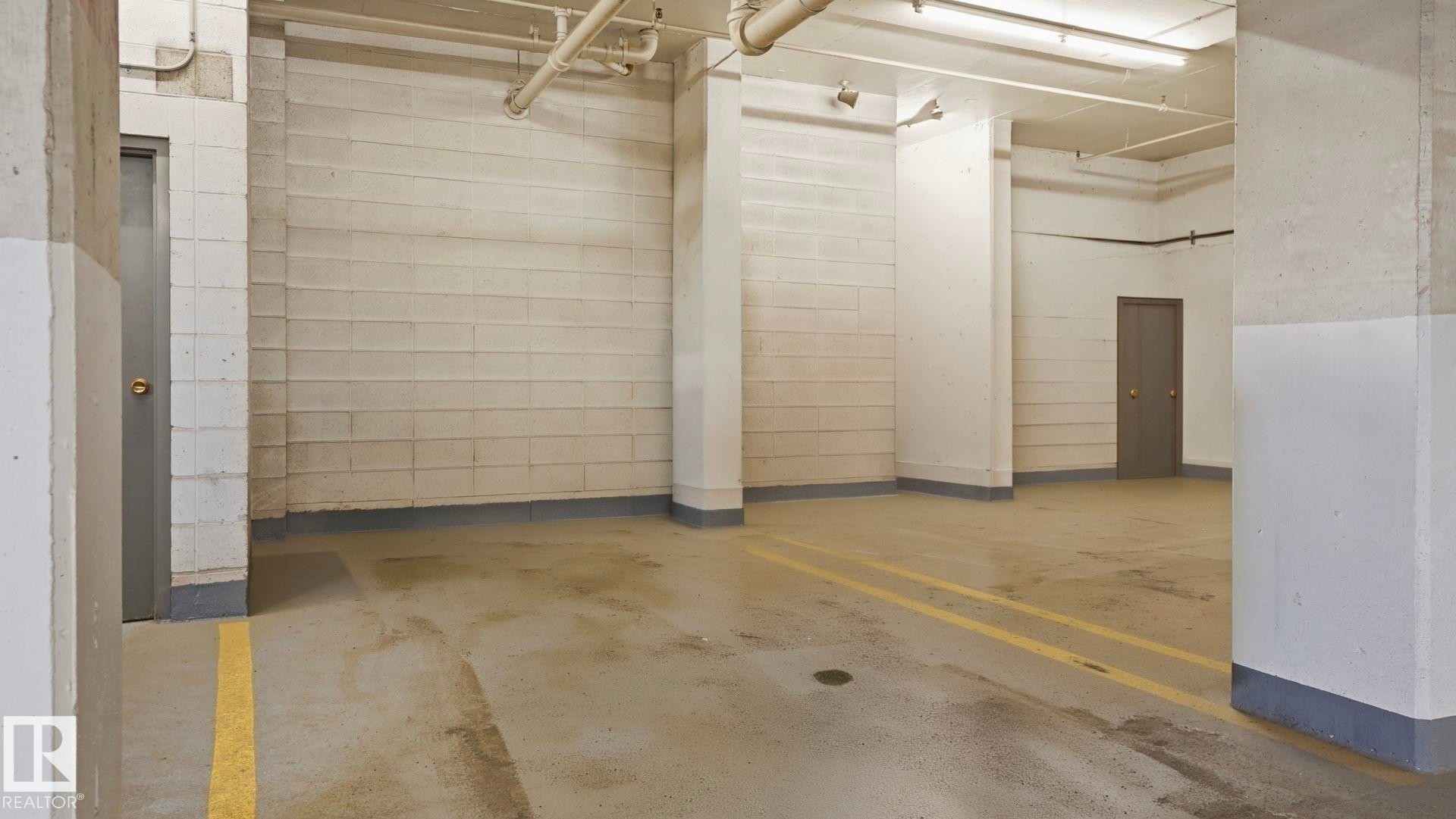 406 12121 Jasper Avenue, Edmonton, AB - Indoor Photo Showing Garage