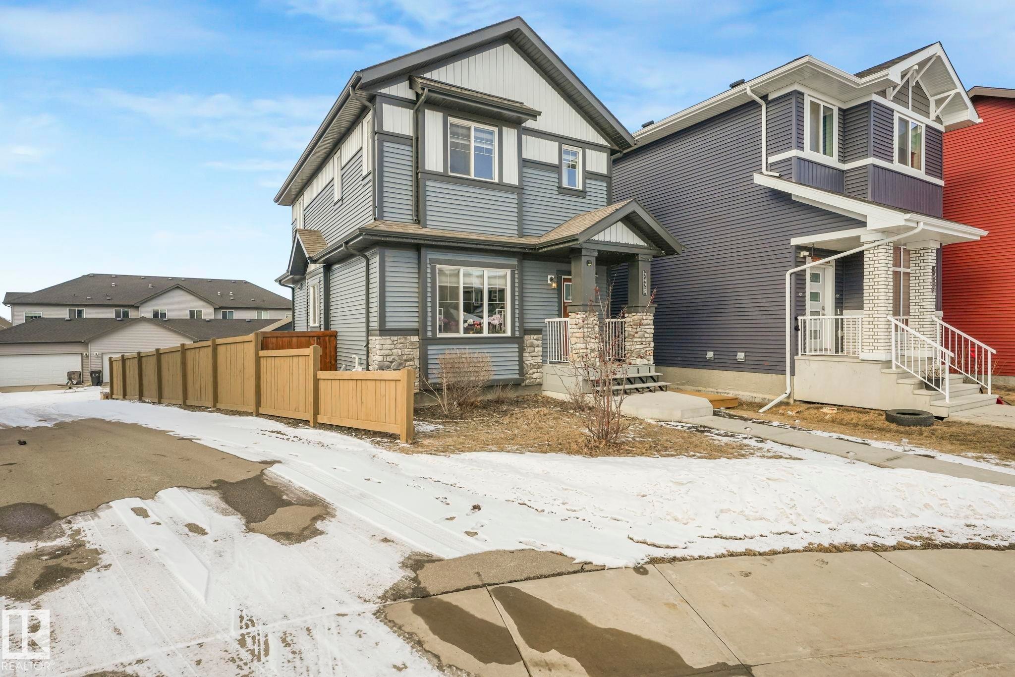 View of front facade with stone siding - 2428 Wonnacott Crest, Edmonton, AB - Outdoor