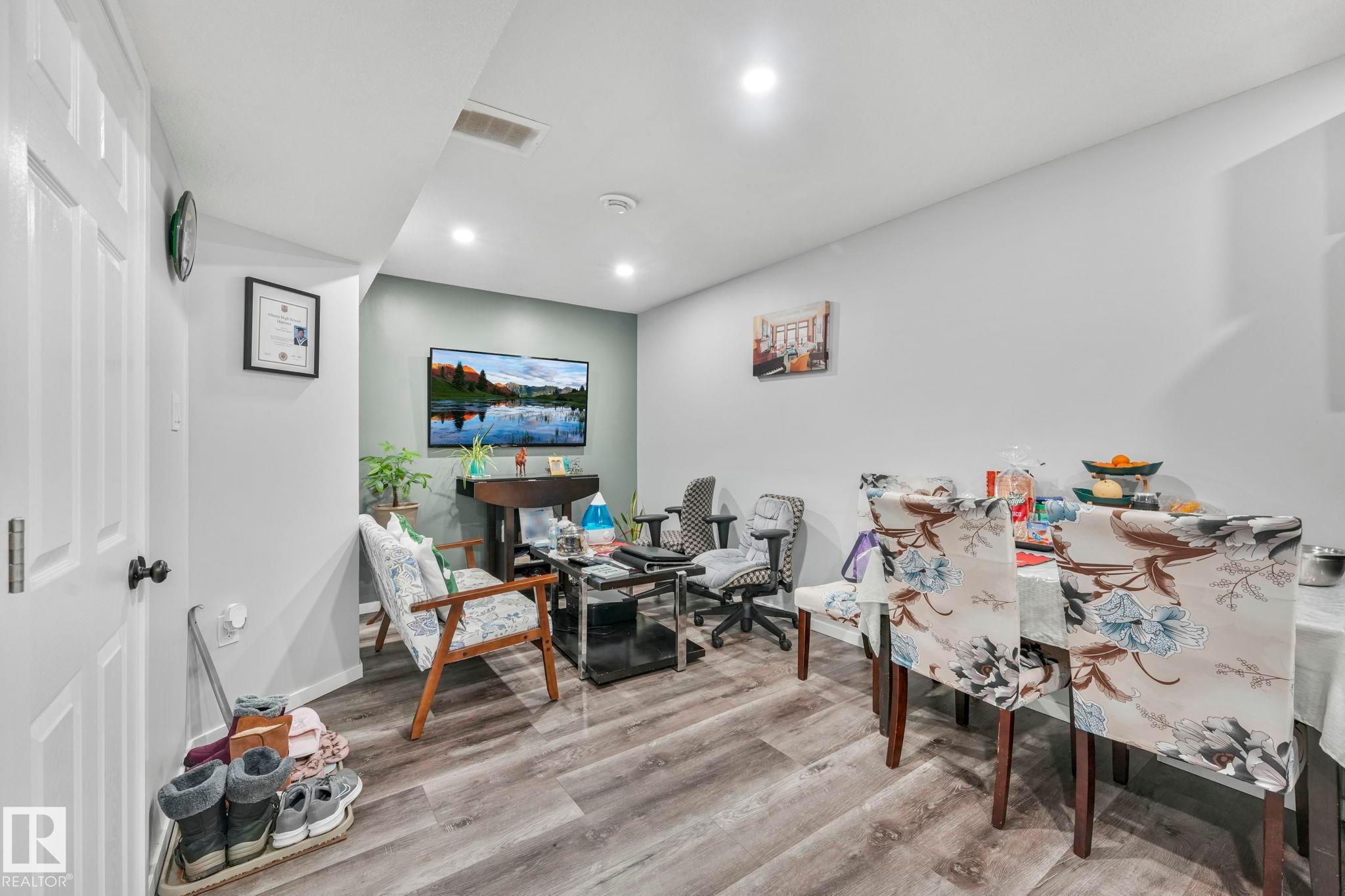 Office with light wood-style flooring and recessed lighting - 2428 Wonnacott Crest, Edmonton, AB - Indoor