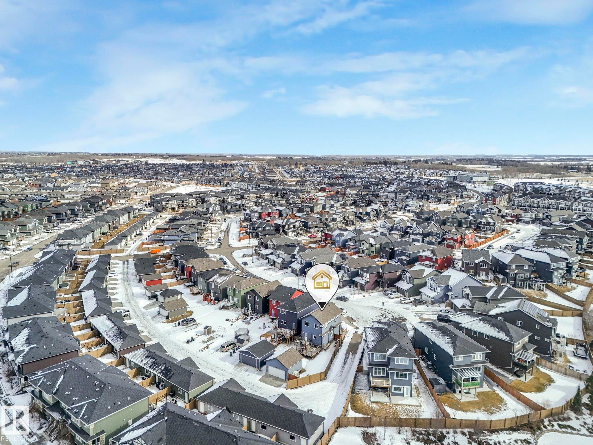 Aerial view of property and surrounding area with nearby suburban area - 2428 Wonnacott Crest, Edmonton, AB - Outdoor With View