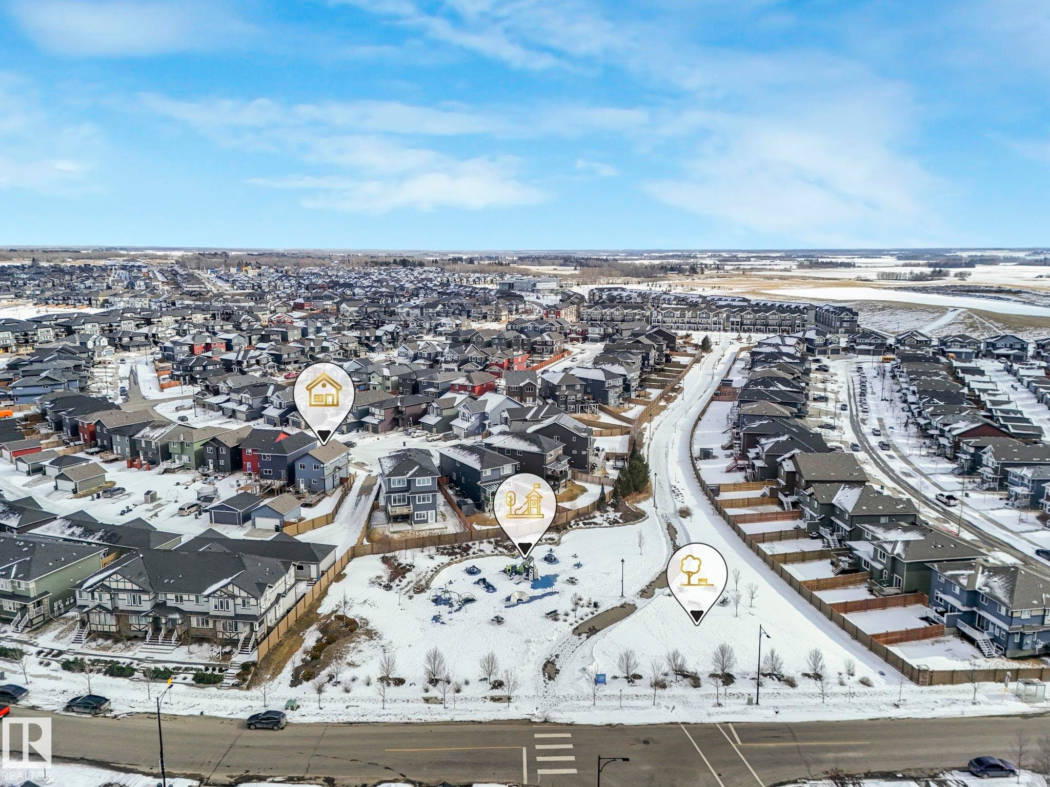Snowy aerial view with a residential view - 2428 Wonnacott Crest, Edmonton, AB - Outdoor With View